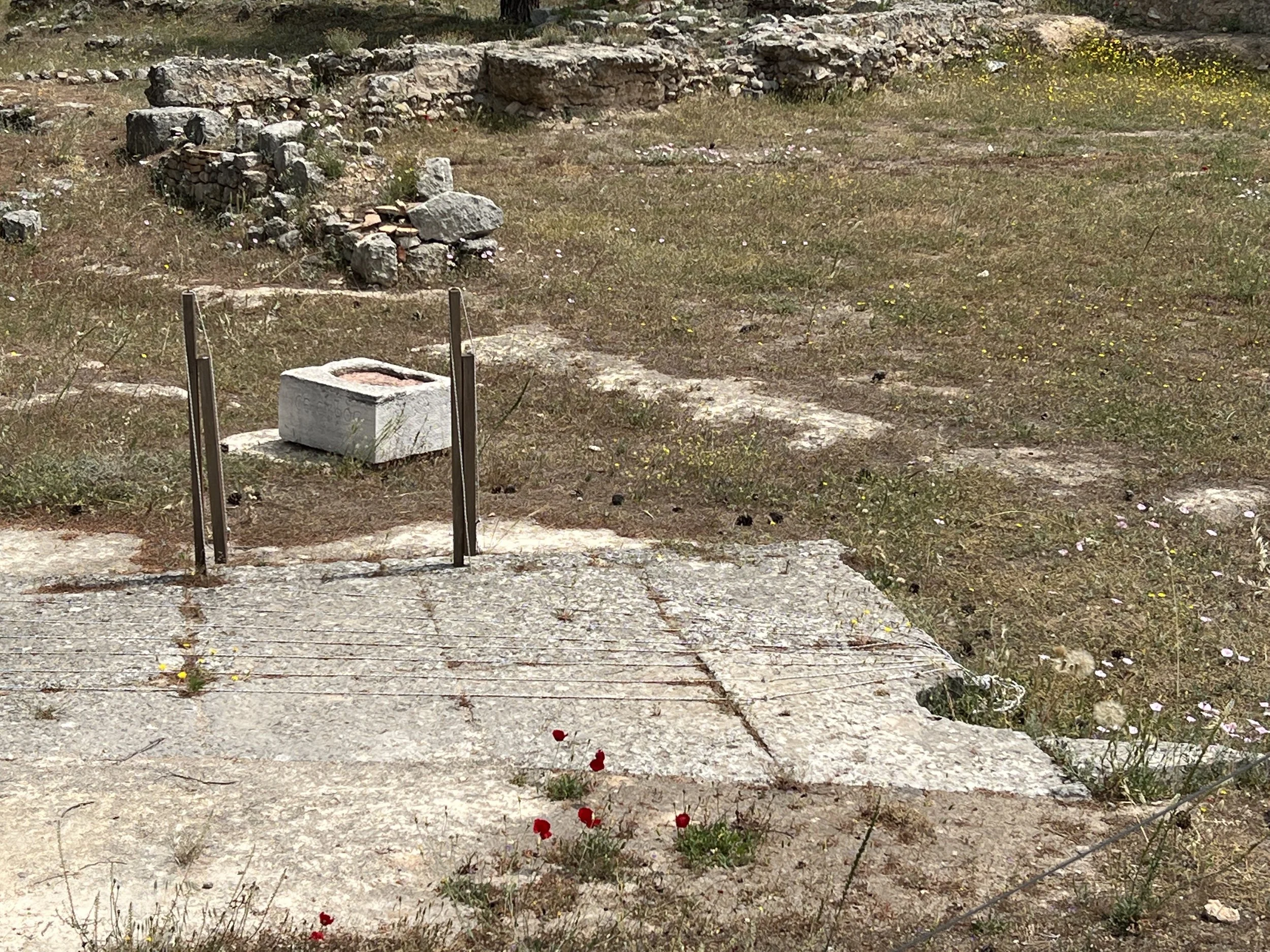 starting mechanism for foot races at one end of the stadium.