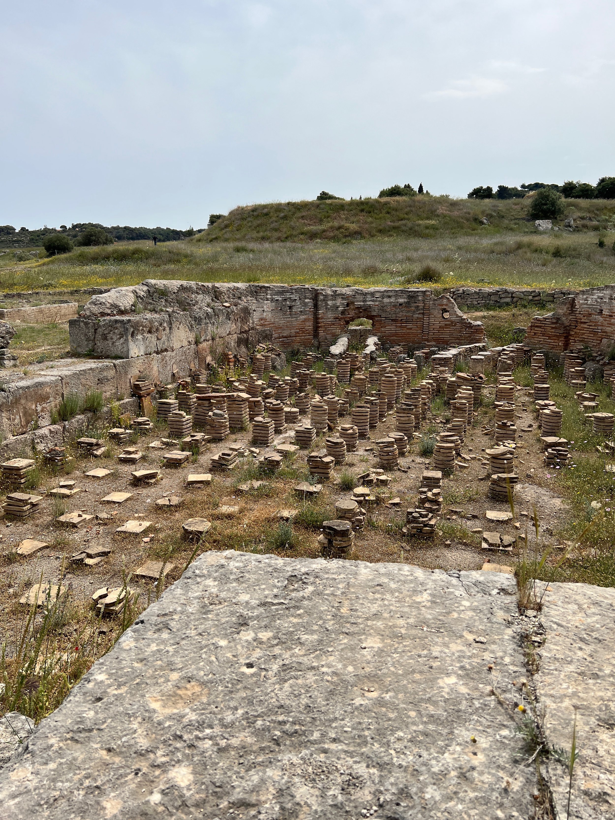Hypocaust - stack software stones under the bath floor to carry heat to heat the water of the pools.