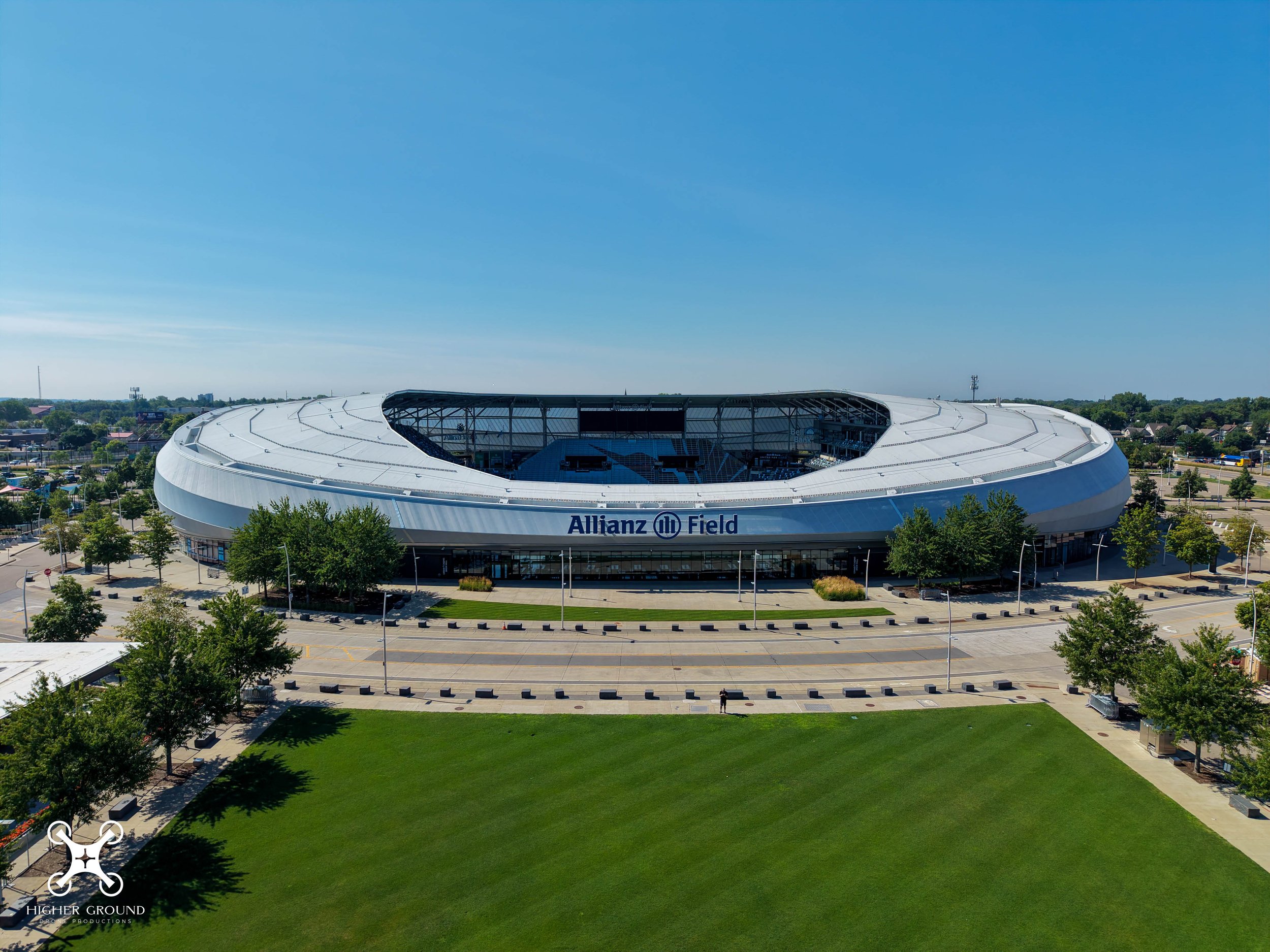 A ring shaped stadium and an illuminated tower of words…