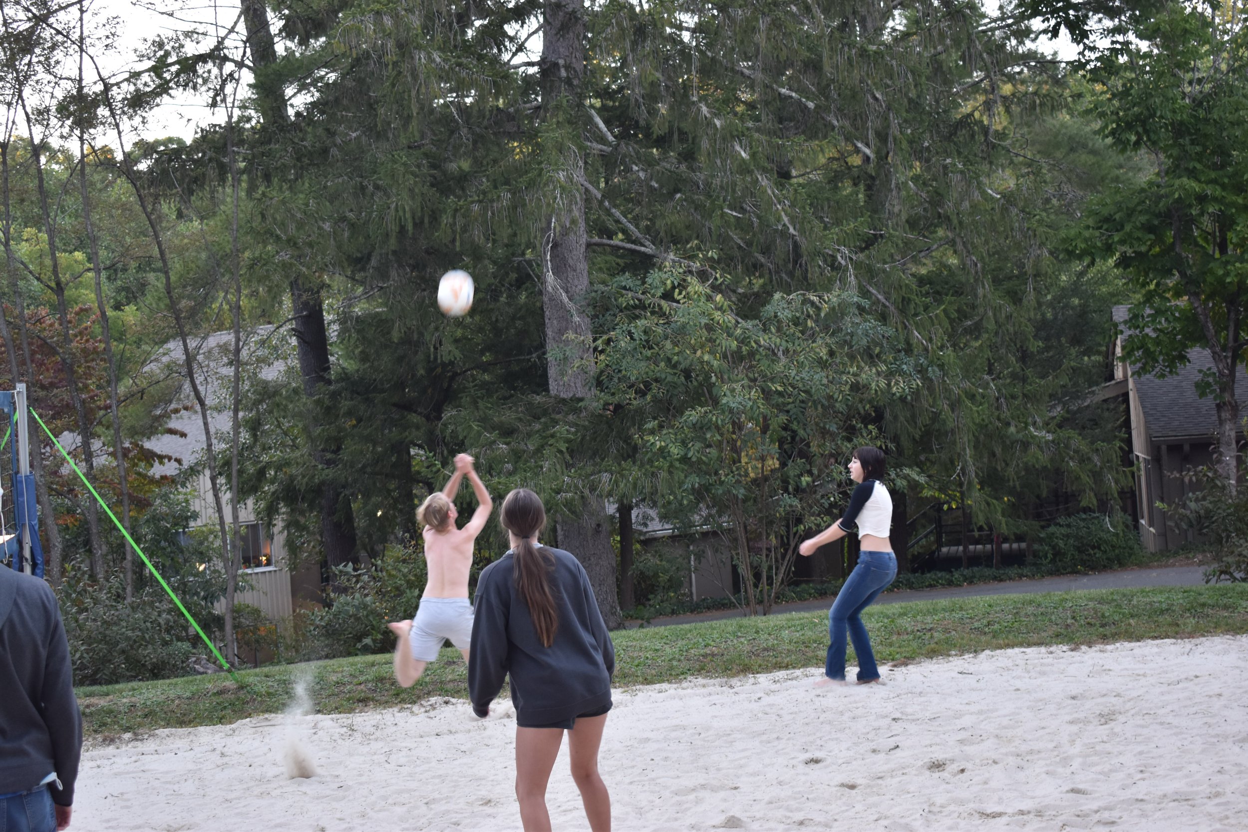  Mac saving the ball from going out during a chilly beach volleyball pickup game. 