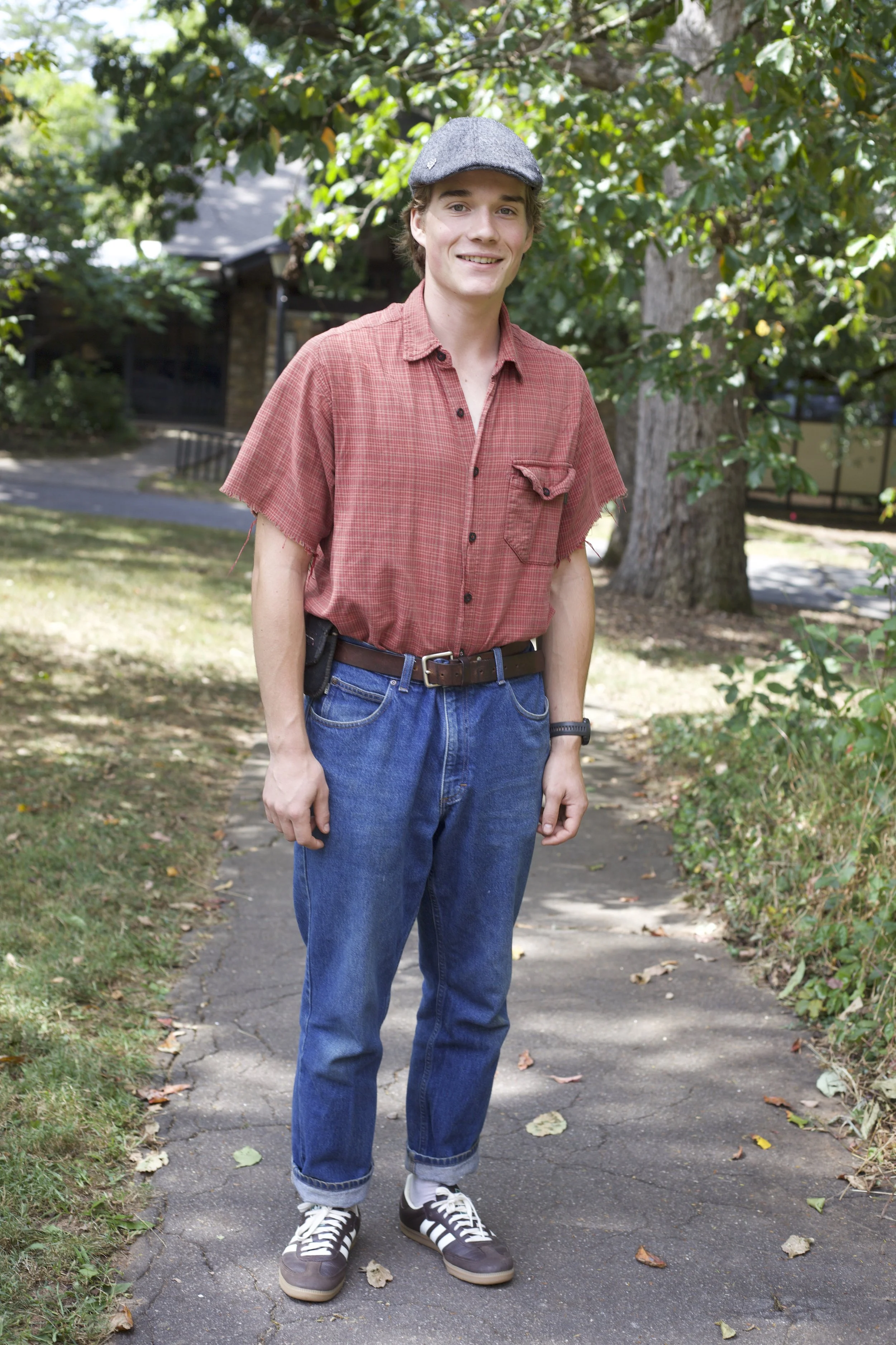 Eliot Heminway sports family heirlooms; his dad’s shirt, hat and pocket knife paired with his grandpa's pants and belt. New Brown sambas and a pin add his own unique touch.