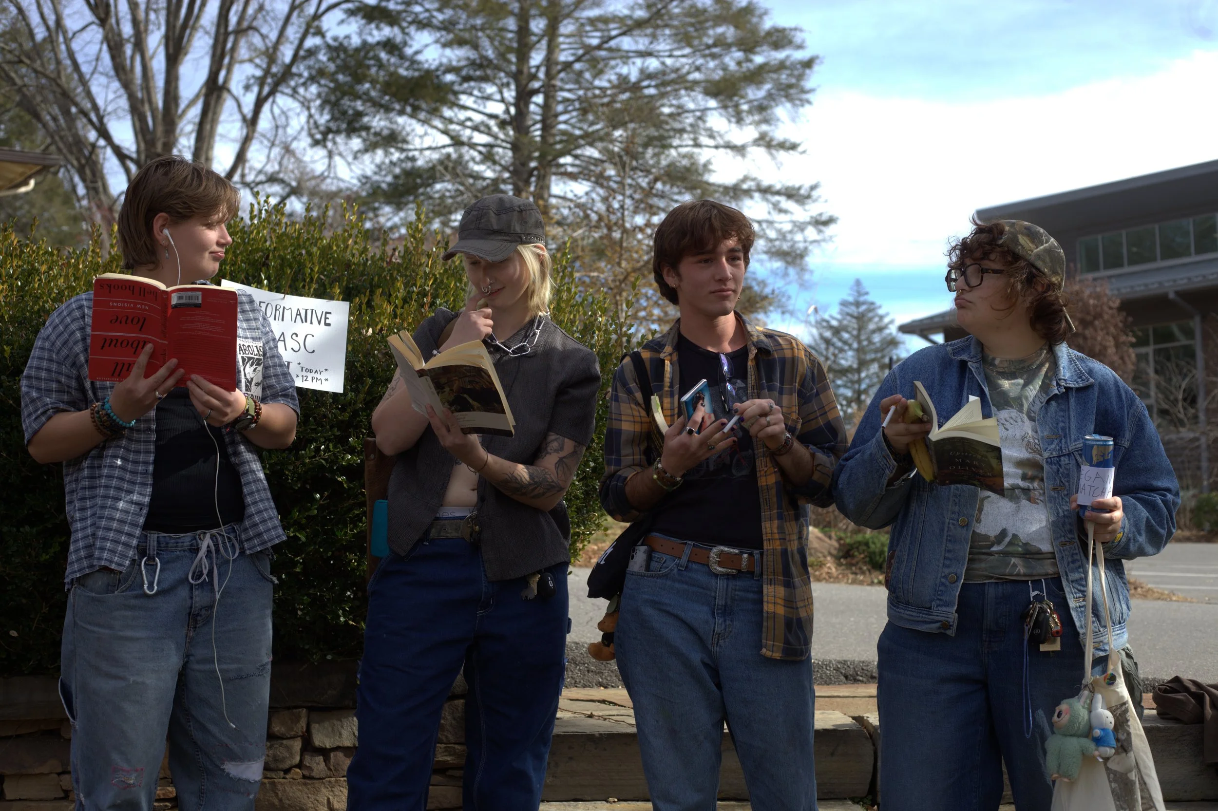   Rena Curtis ,  Ursula Curlin, Sonny Church  and  Mazzaroth Carroll  pose for the performative masc contest at Warren Wilson College (WWC) on November 18, 2025. (Echo/Emma Taylor McCallum) 
