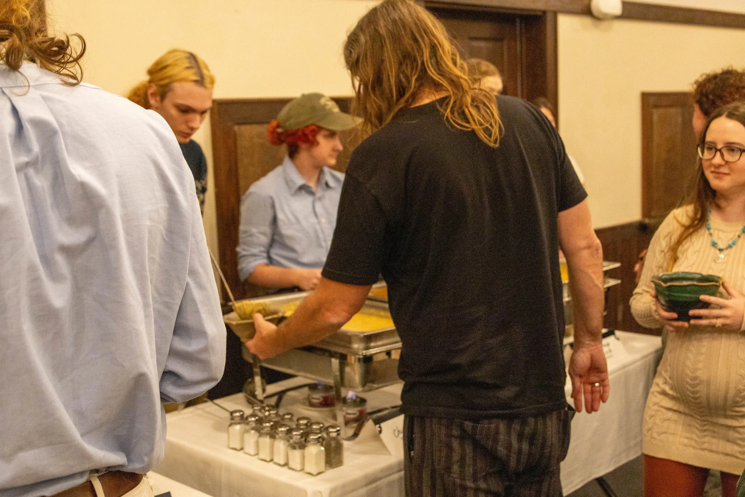  Students wait in line at the Warren Wilson College (WWC) Empty Bowls dinner on November 19, 2025. (Neko Heinrich/Echo) 