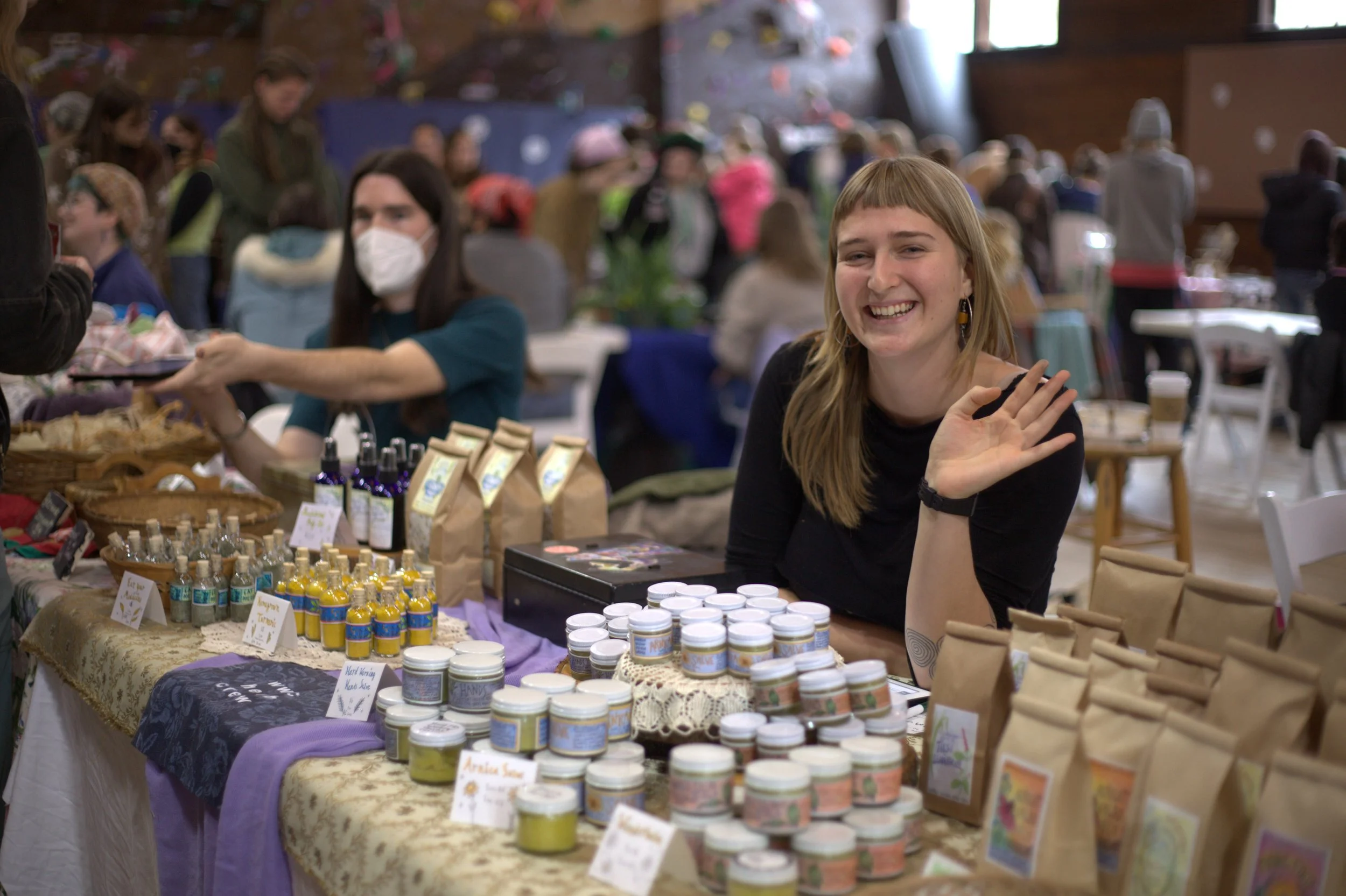  Herb Crew member Pema Greenberg sells tinctures and other handmade products at the Warren Wilson College (WWC) Winter Sale on December 6, 2025. (Echo/Emma Taylor McCallum) 