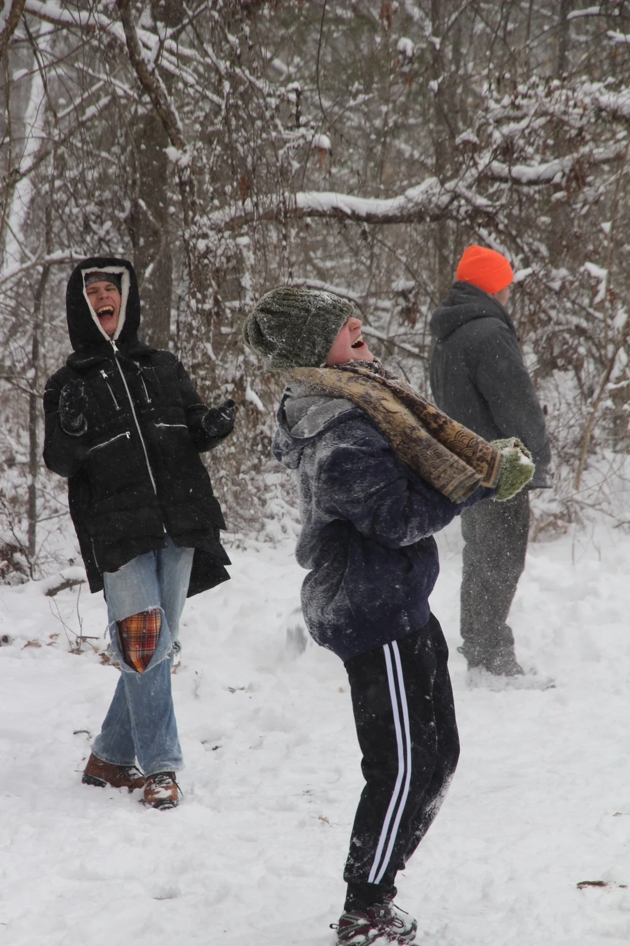 Students laugh as they play in the snow on the campus of Warren Wilson College in Swannanoa, N.C., Jan. 31, 2026. 