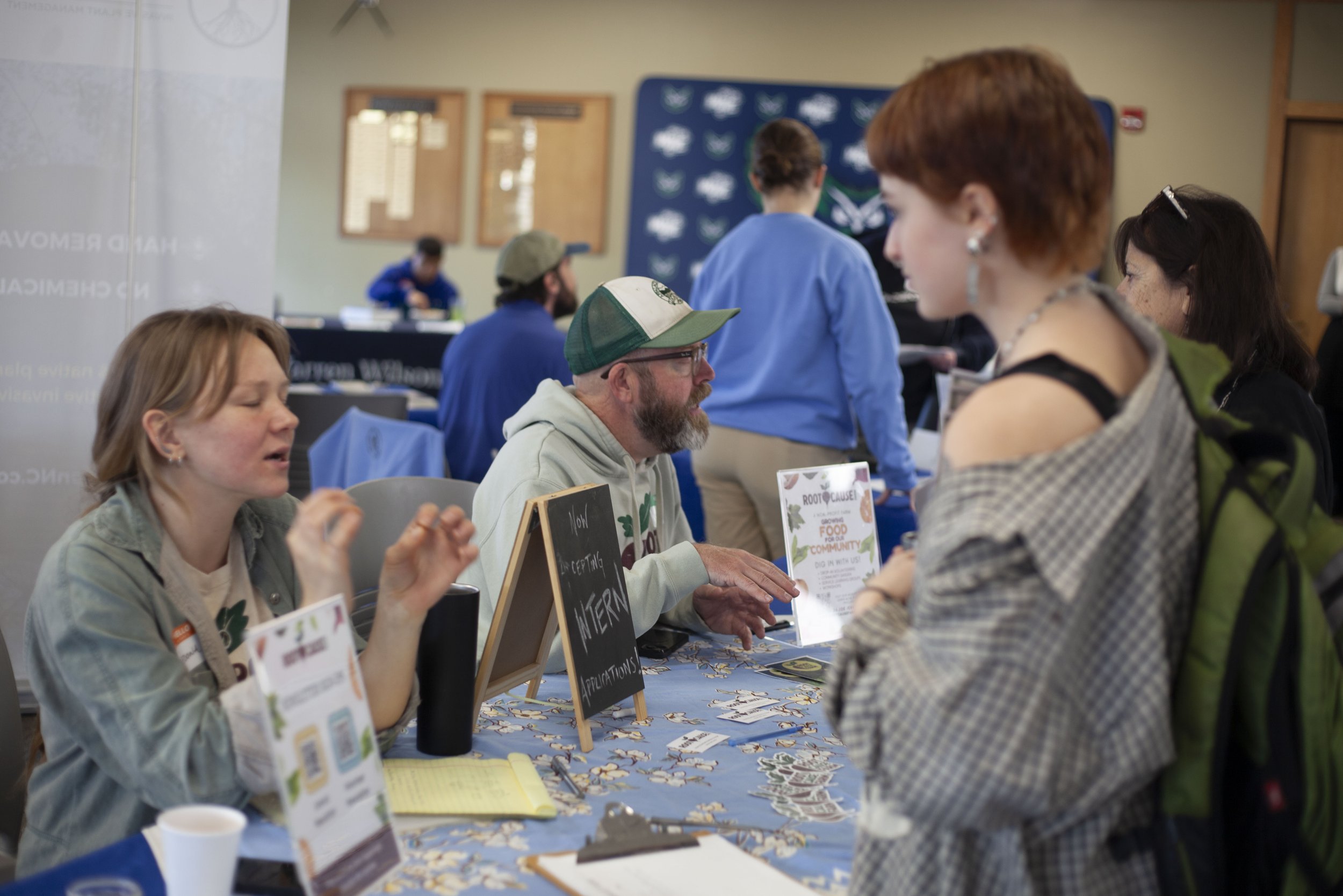  A student discusses internship opportunities with Root Cause Farm representatives during the internship fair at Warren Wilson College, on Feb. 12, 2026 in Swannanoa, N.C. (Echo/Emma Taylor McCallum) 