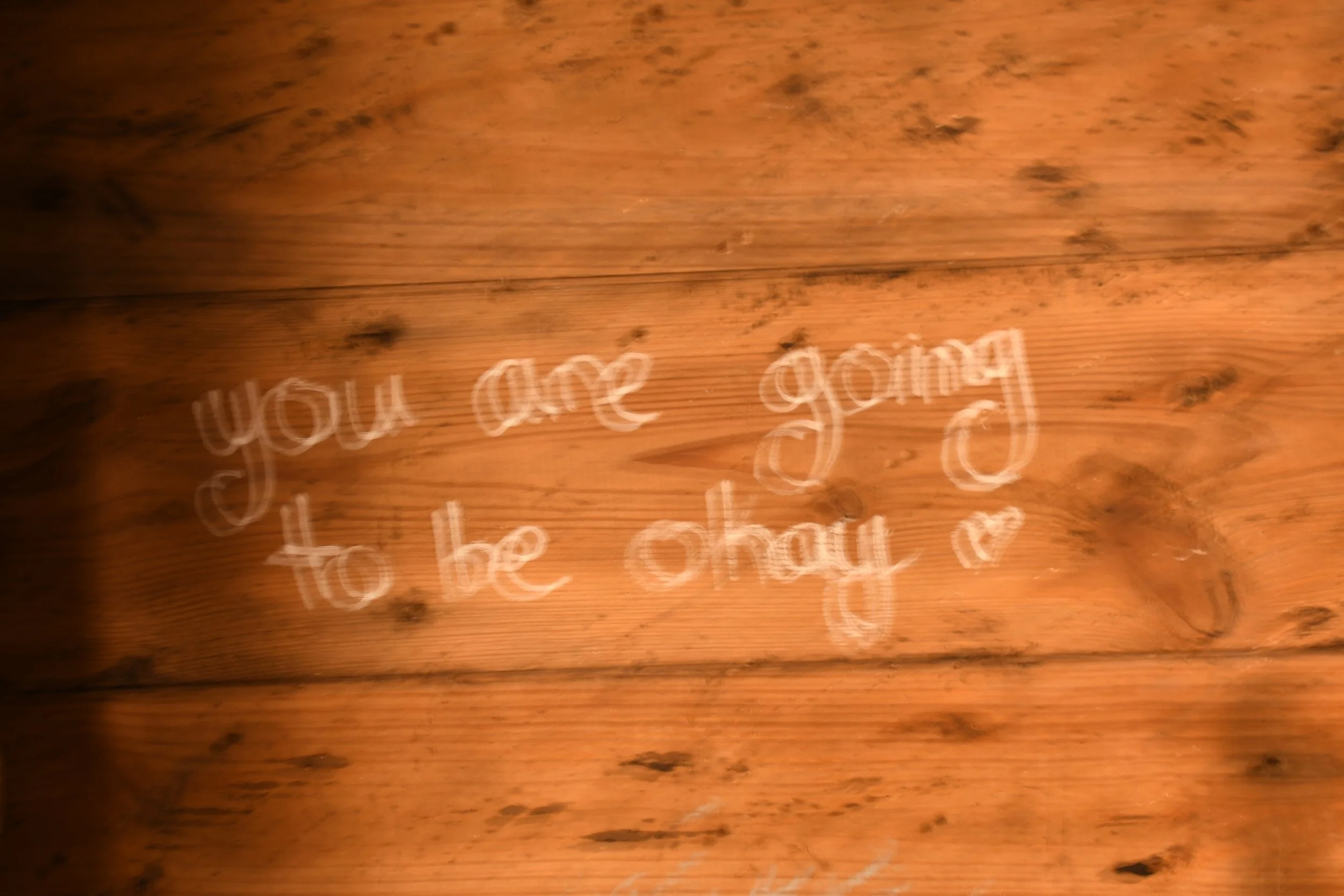  Long exposure of chalk graffiti in Meditation Hut reading “you are going to be okay,” Warren Wilson College (WWC) campus in Swannanoa, N.C., on Feb. 27, 2026. (Echo News/Richmond Joyce) 
