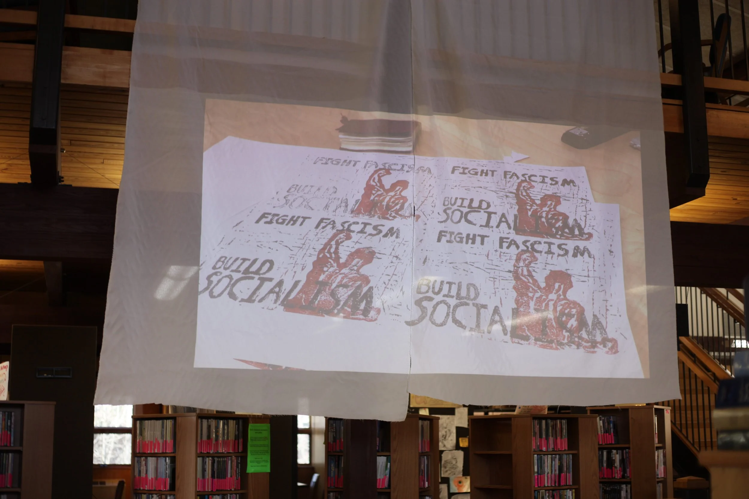  “Mine, this really big one here, is about capitalism…that fascism, and that we actually have a role to play defeating the system and building a new system,” Gus Larsen said. 
