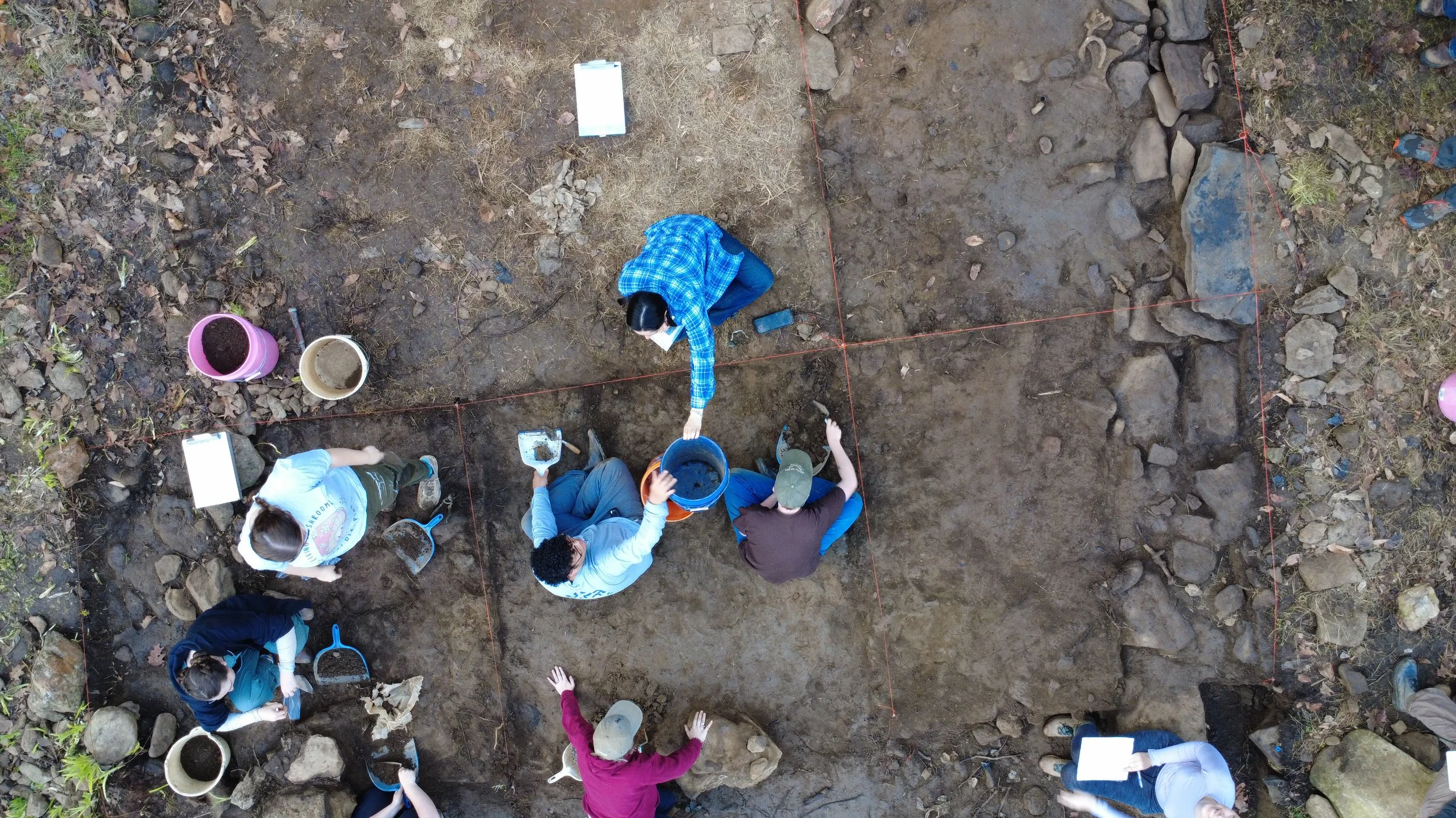  Drone photo of students at work excavating the Boyd Cabin archeological site in Sandy Mush, Buncombe County NC on Mar. 13, 2026. (Echo News/Scotti Norman) 