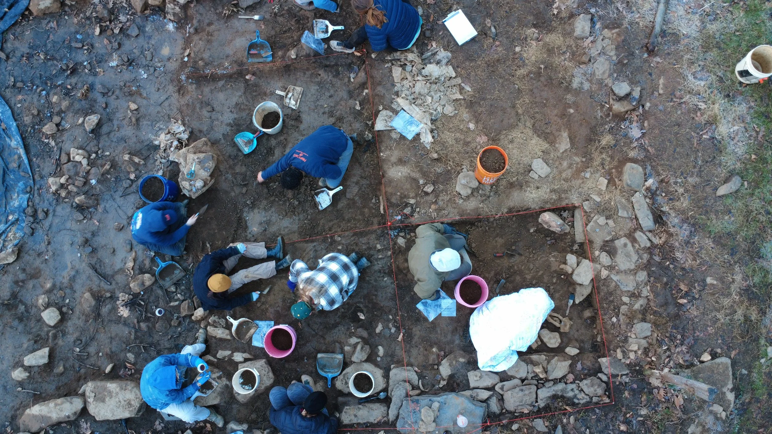  Drone photo of students at work excavating the Boyd Cabin archeological site in Sandy Mush, Buncombe County NC on Mar. 13, 2026. (Echo News/Scotti Norman) 