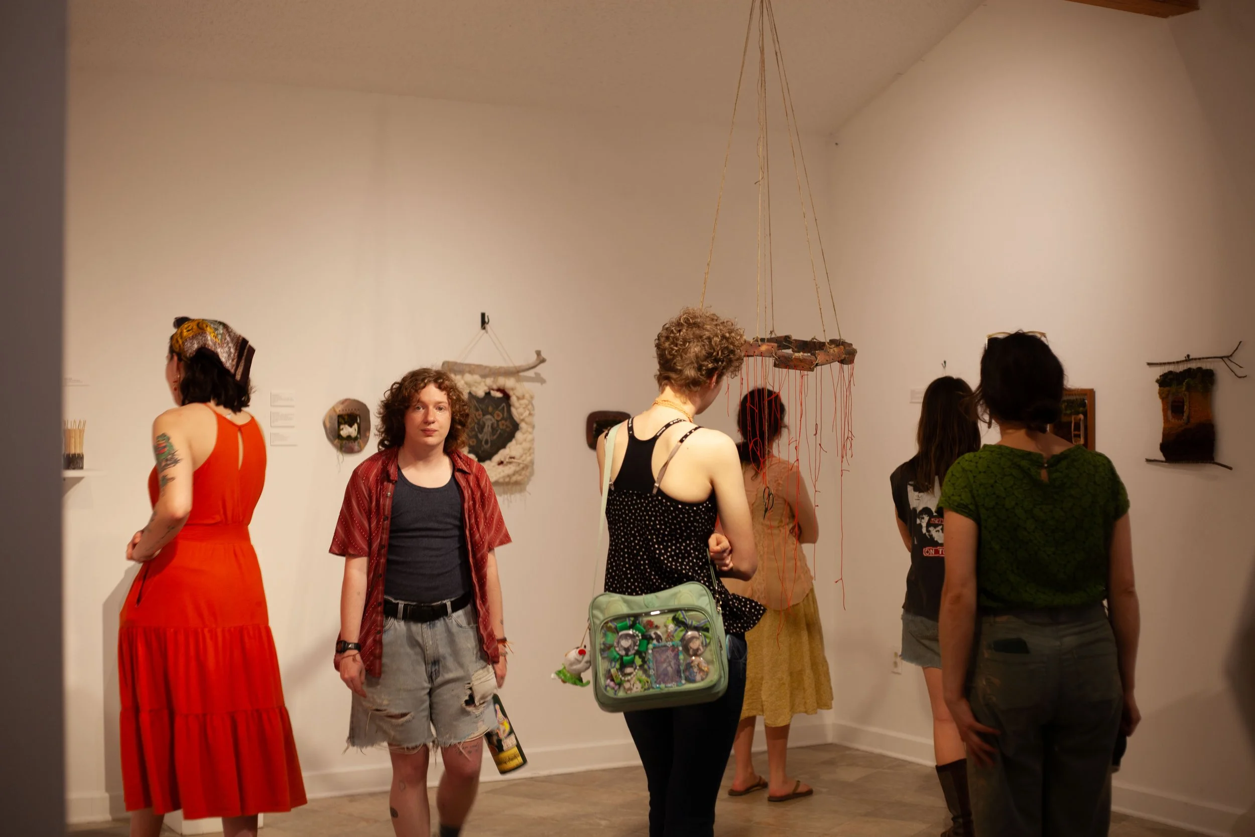  Patrons wander among the art at the “Perspective” show in Swannanoa, N.C. on April 3, 2026. (Echo/Emma Taylor McCallum) 