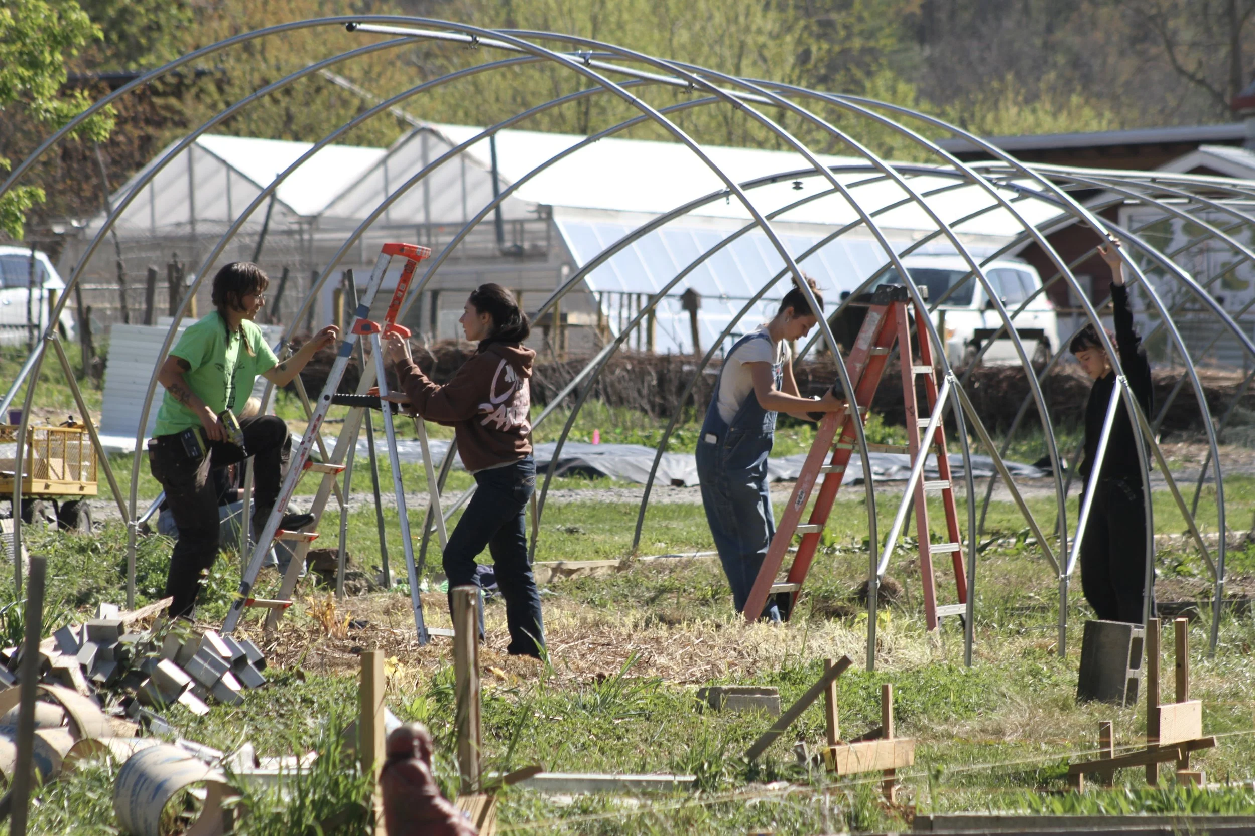 Students work to maintain outdoor spaces at Warren Wilson College (WWC) on Thursday, April 9, in Swannanoa, N.C. (Echo/Vivian Bryan)