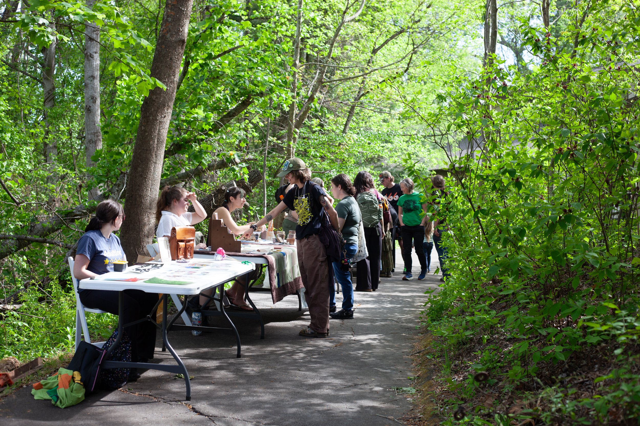  Students and community members look at pieces showcased at the annual Spring Arts Sale where student artists sell their work at Warren Wilson College, on April 21, 2026 in Swannanoa, N.C. (Echo/Emma Taylor McCallum)    
