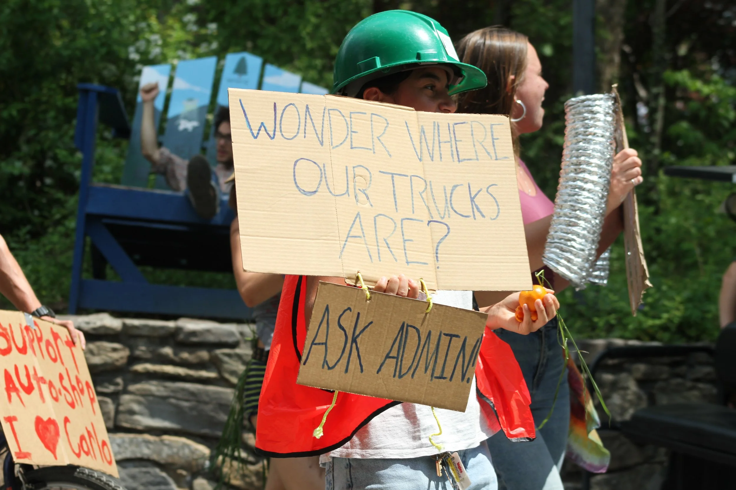  Students protest the Warren Wilson College administrations’ actions towards the Autoshop during the annual Big Gay Earth Day parade on April 24, 2026 in Swannanoa, N.C. (Echo/Vivian Bryan) 
