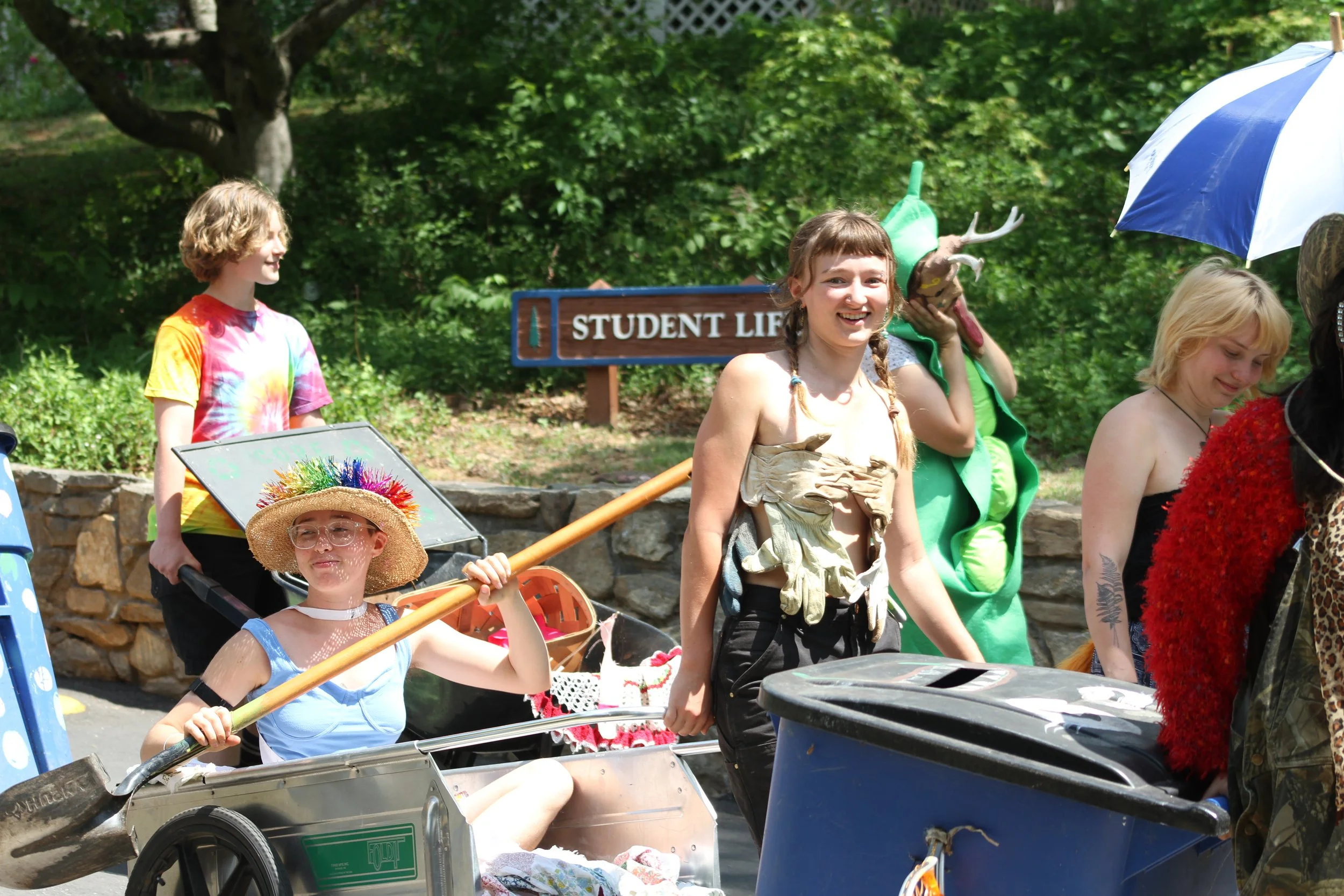  Students Aurora Gilley and Ella Tatro walk in the 2026 Big Gay Earth Day parade at Warren Wilson College in Swannanoa, N.C. on April 24, 2026. (Echo/Vivian Bryan) 