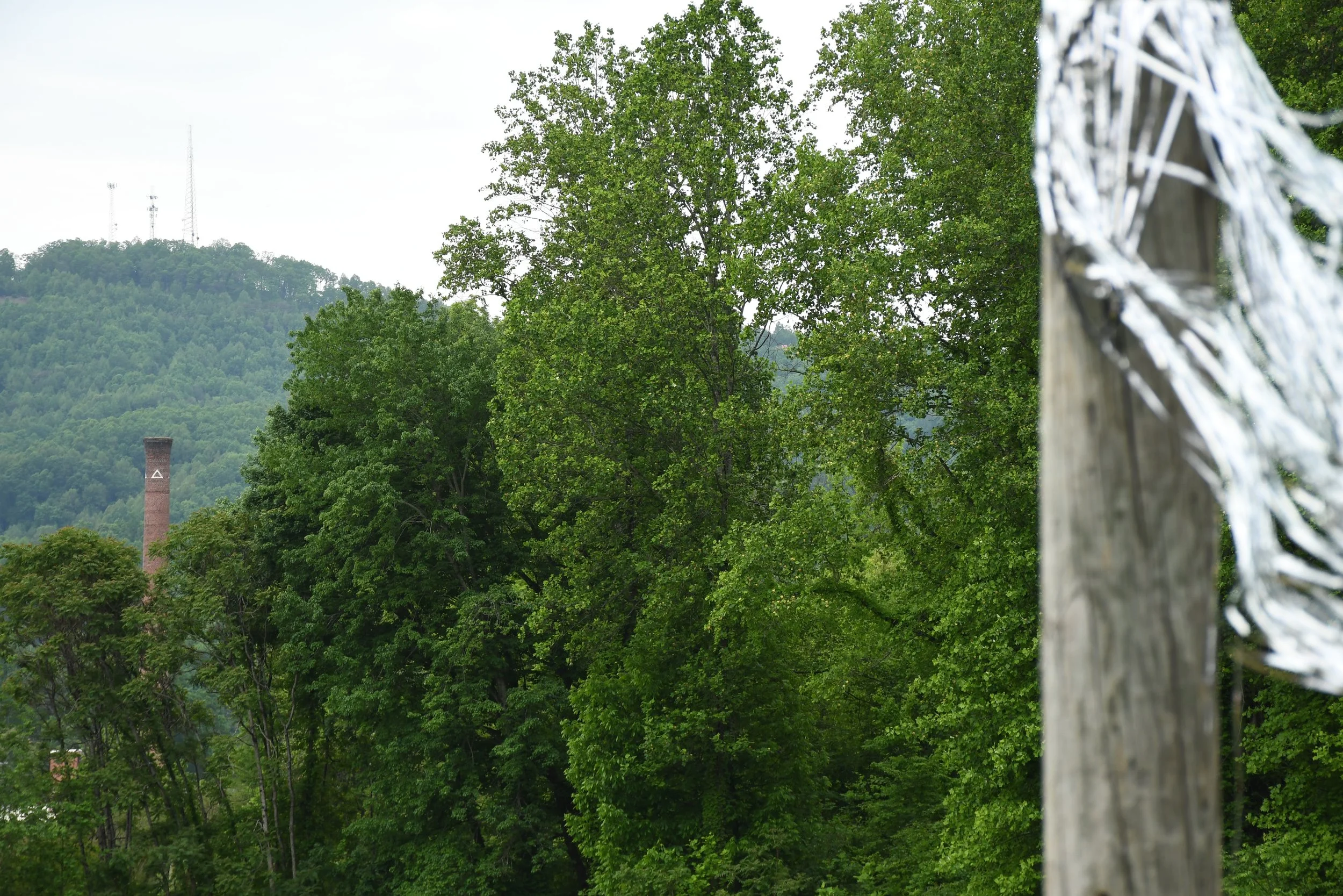 View of the old Marion Manufacturing smokestack from the location of the homecoming in Marion, McDowell County NC on April 25 2026. (Richmond Joyce/Echo News) 