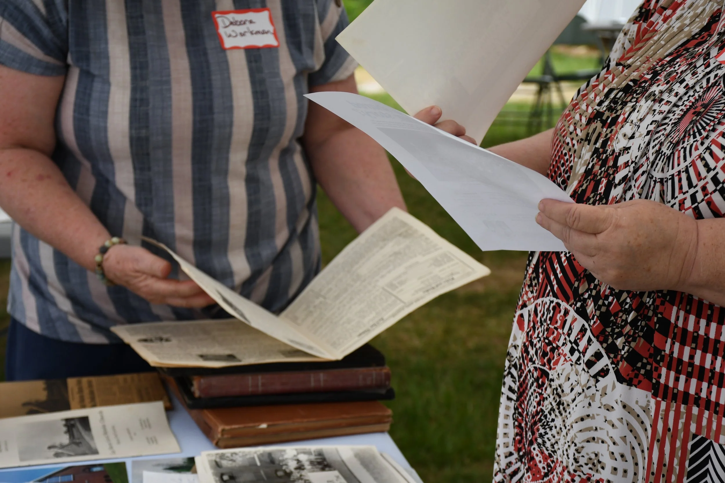  Citizens reading about the history of their town at the homecoming in Marion, McDowell County NC on April 25 2026. (Richmond Joyce/Echo News) 