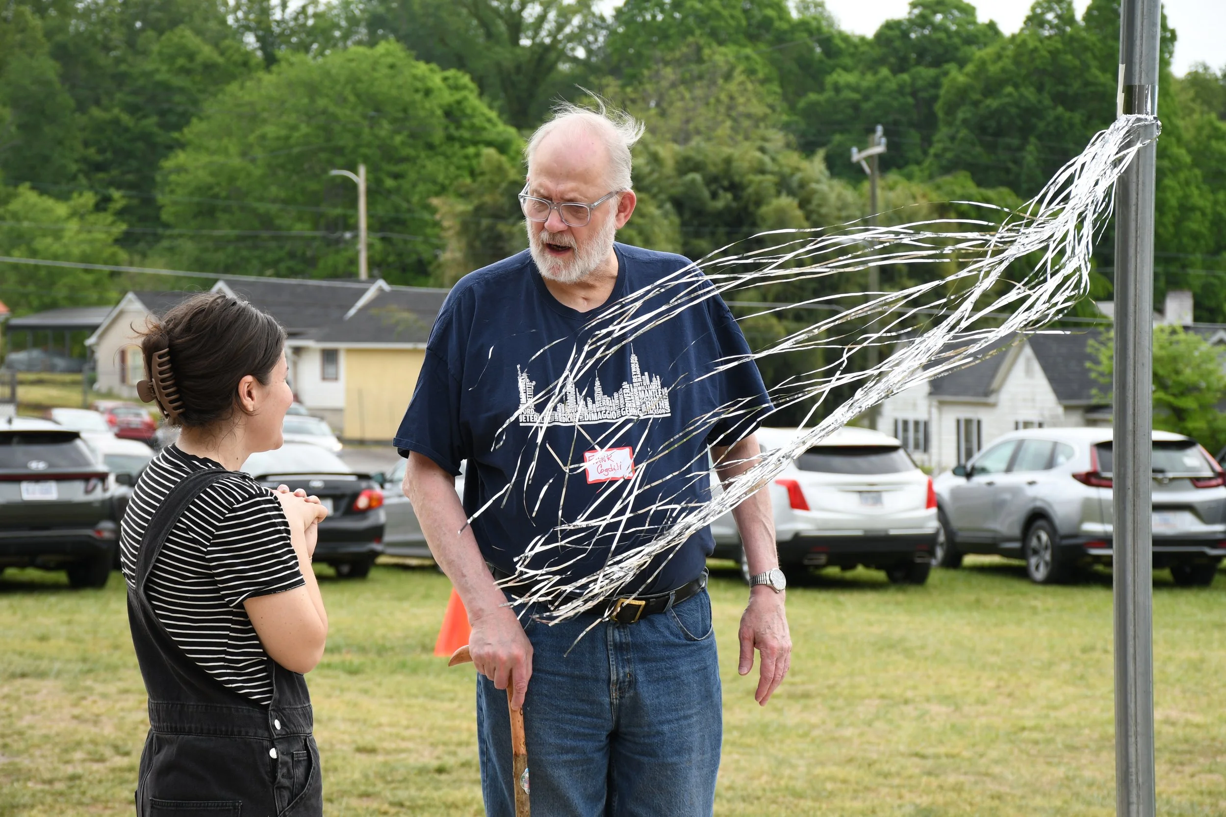 Professor Jordan Laney talking to a citizen at the homecoming in Marion, McDowell County NC on April 25 2026. (Richmond Joyce/Echo News) 