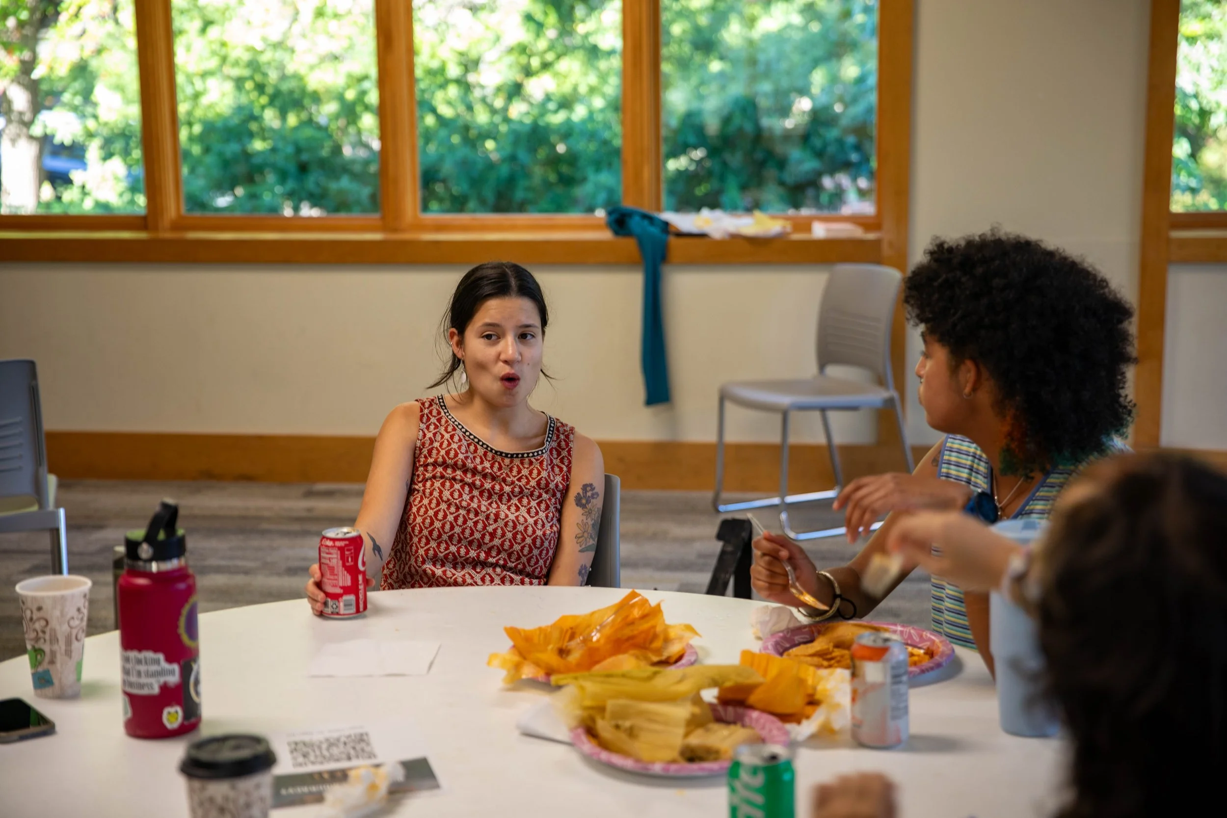  Students chat at “What is Democracy?” film screening in Canon Lounge at Warren Wilson College (WWC) in Swannanoa, N.C. on Sept. 3. (WWC/Emily Cobb) 