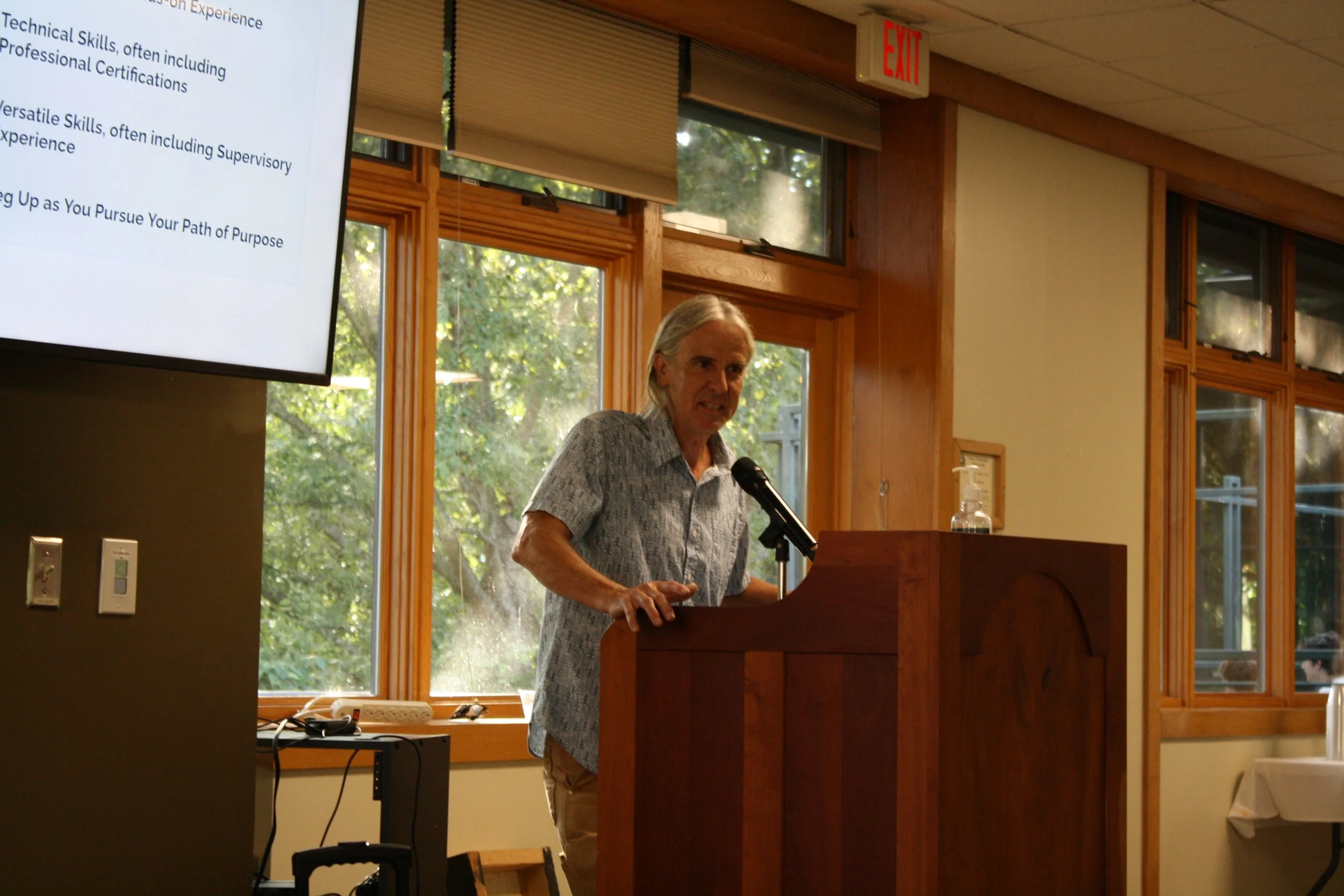  Dave Ellum, Dean and Director, The Center for Working Lands at Warren Wilson College speaks in front of students at the State of the College Address on Sep. 2, 2026, Swannanoa, N.C. (Echo/Emma Taylor McCallum) 