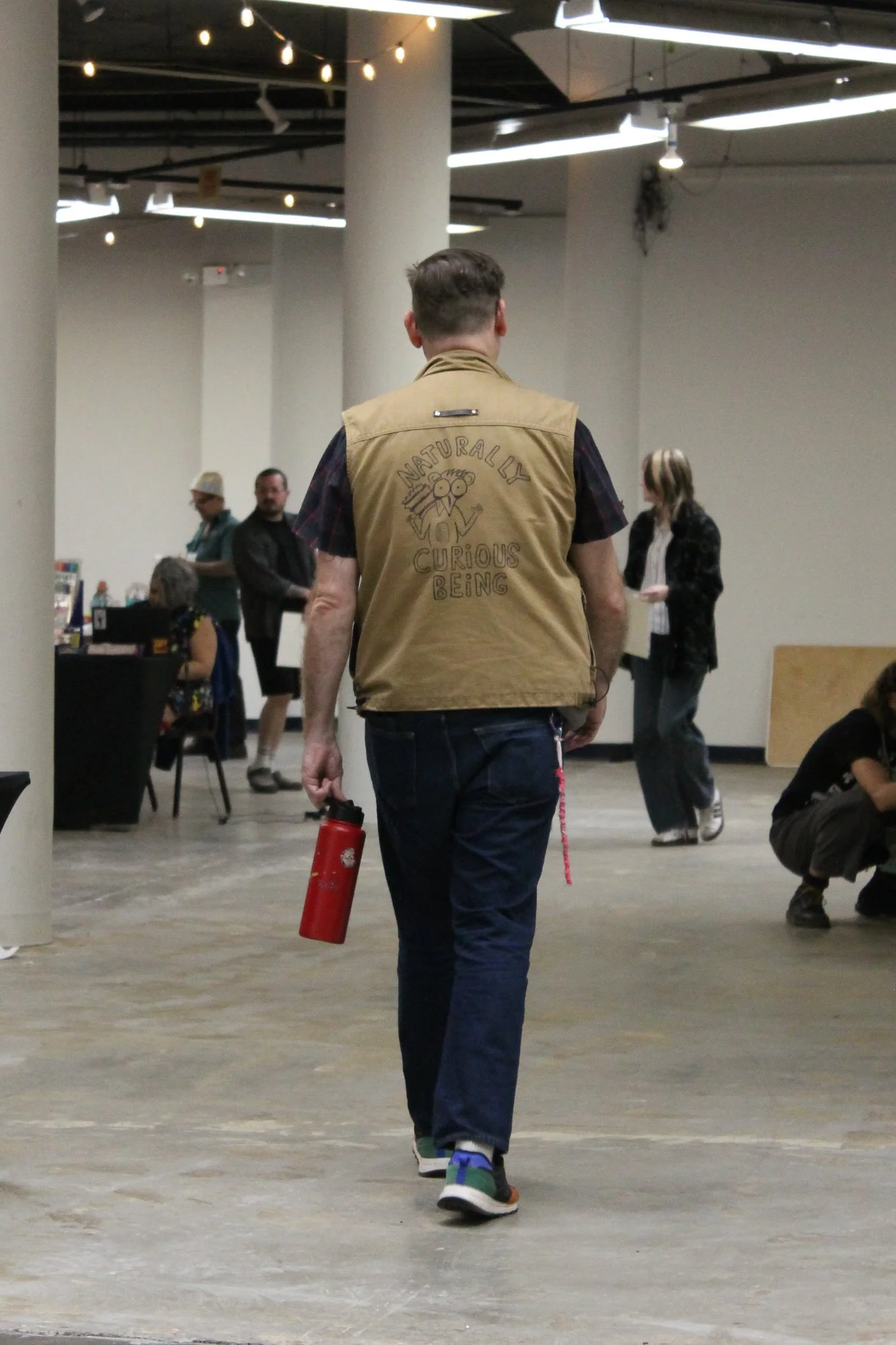  The creator of Naturally Curious Beings takes a walk around the Asheville Zine Fest expo hall in Asheville, N.C.,Saturday Sept. 26, 2026. (Echo News/Wyatt Layton) 