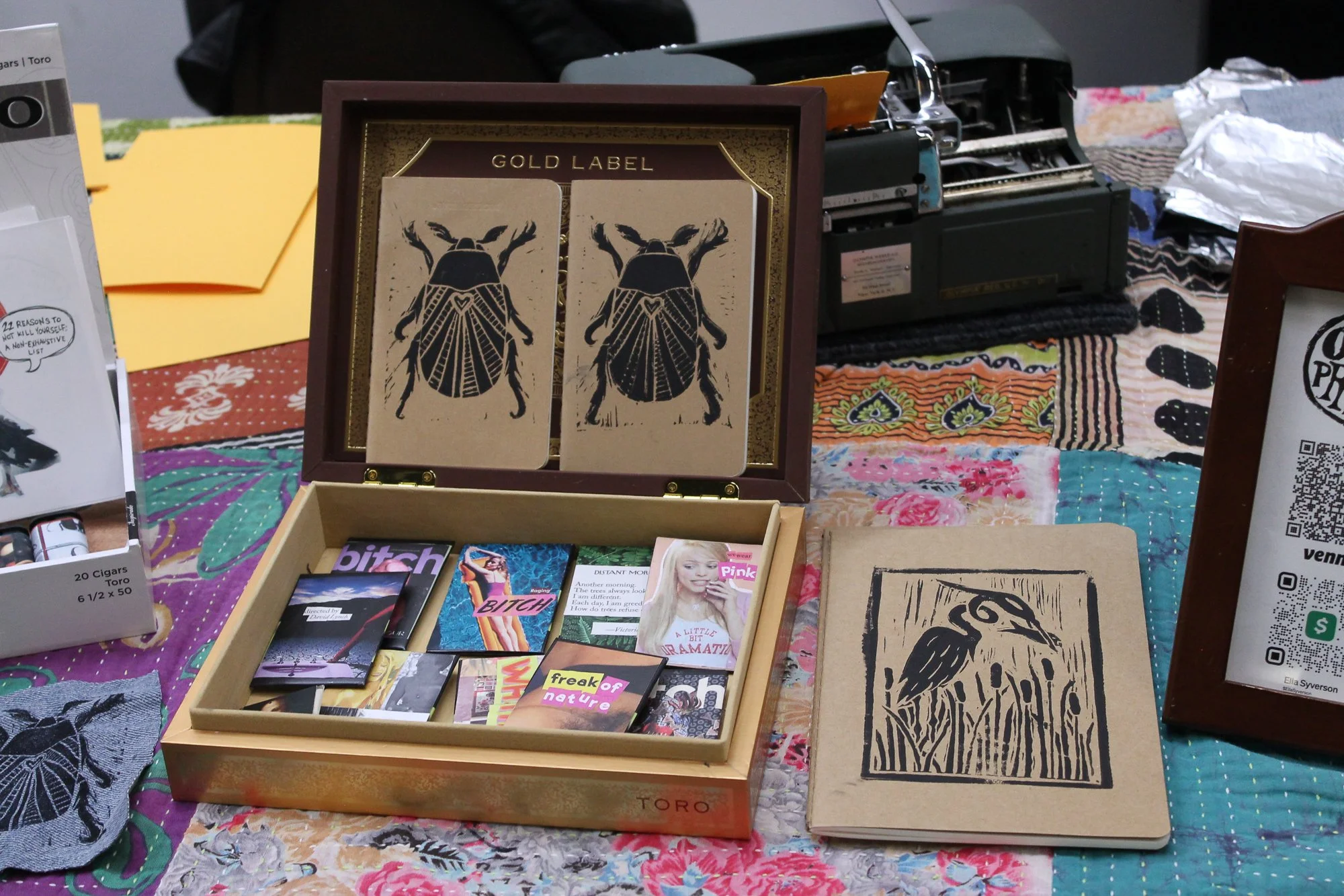 Odo Prints’ booth, featuring block-printed notebooks and pop-culture zines for sale. Asheville, N.C.,Saturday Sept. 26, 2026. (Echo News/Wyatt Layton) 