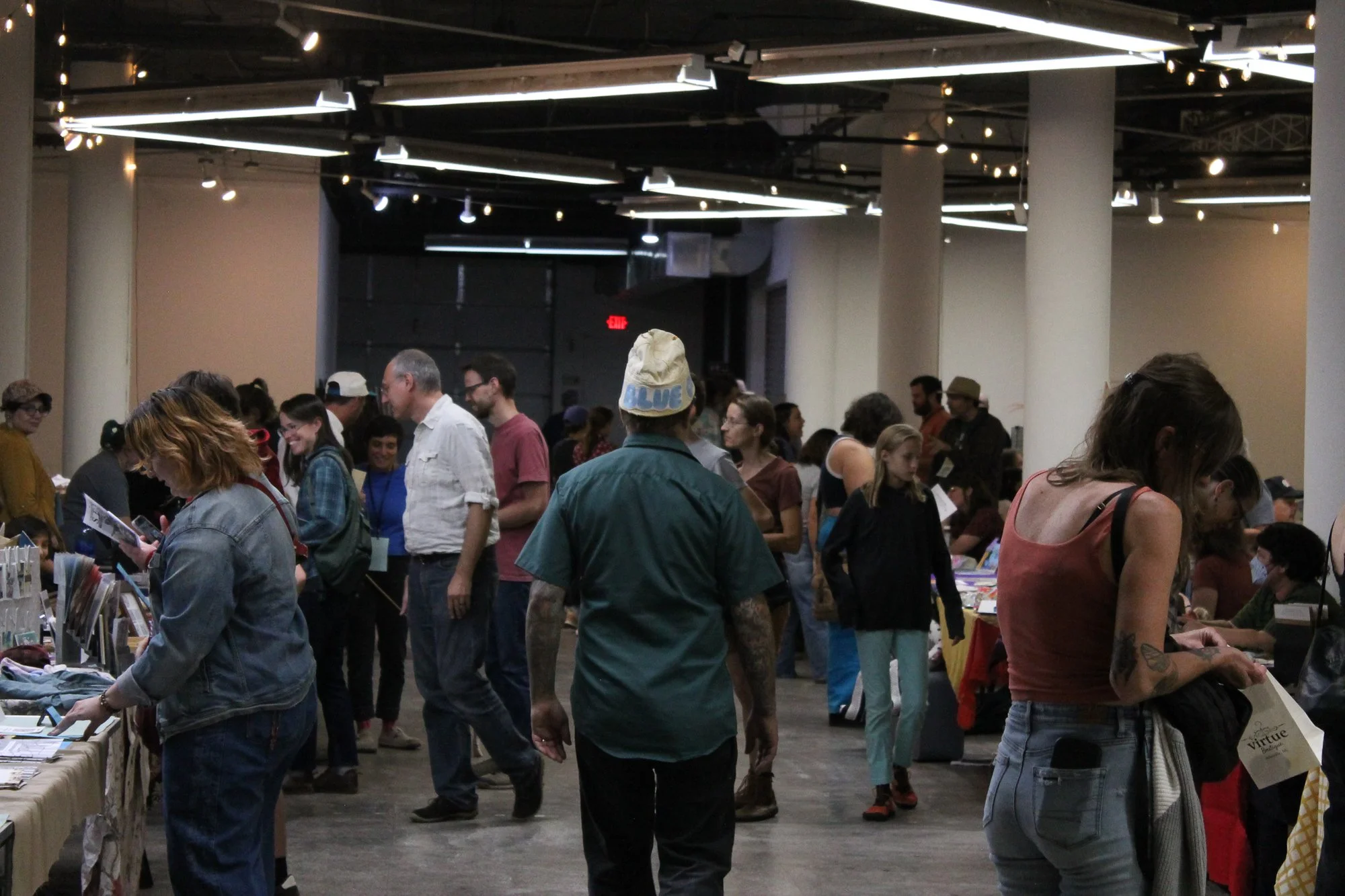    Tim Root   making his way through the crowd at Asheville Zine Fest in Asheville, N.C., Saturday Sept. 26, 2026. (Echo News/Wyatt Layton) 