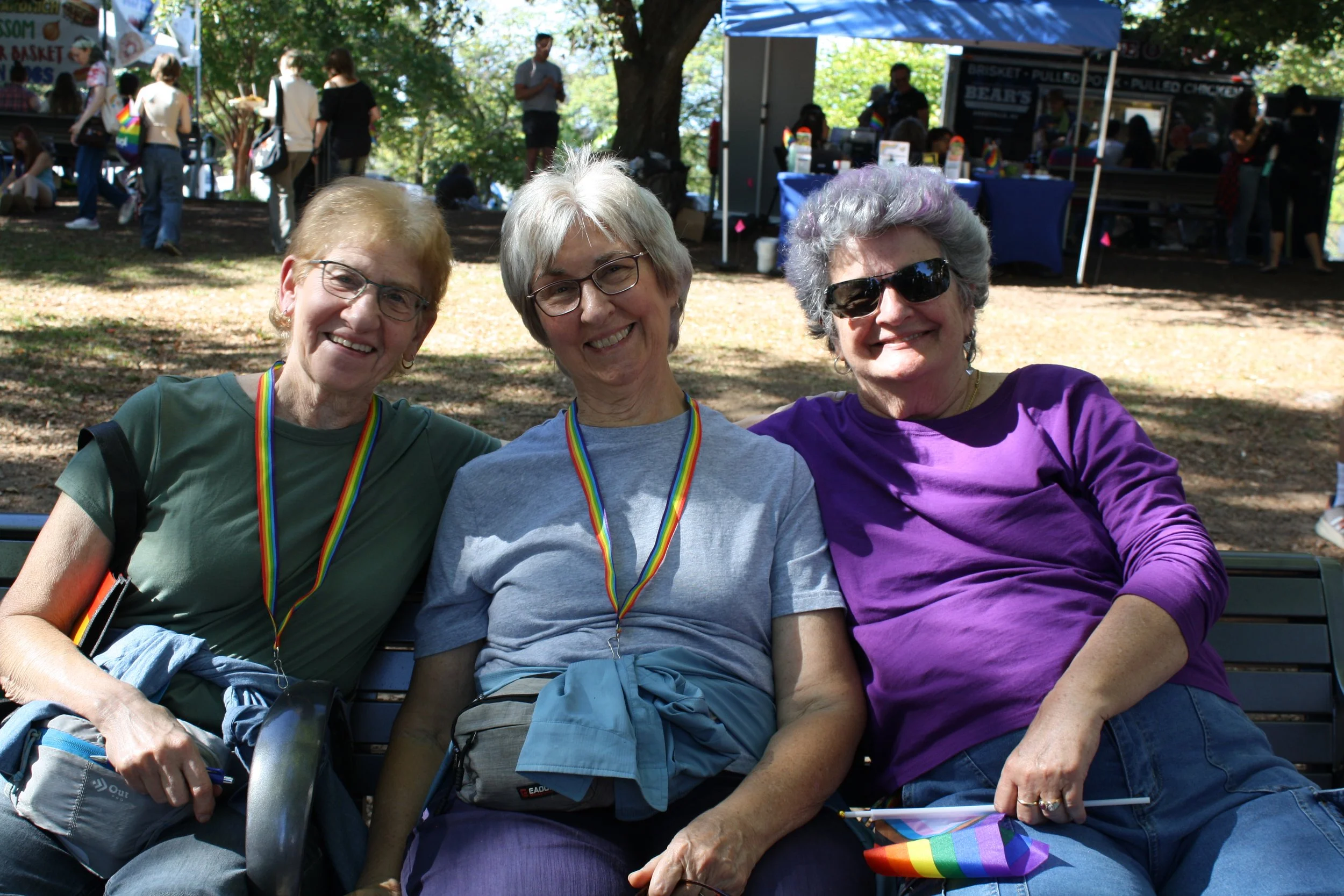  “Three dykes on a bench” at Blue Ridge Pride on Sep. 26, 2026 in Pack Square Park in Asheville, N.C. (Echo/Emma Taylor McCallum) 