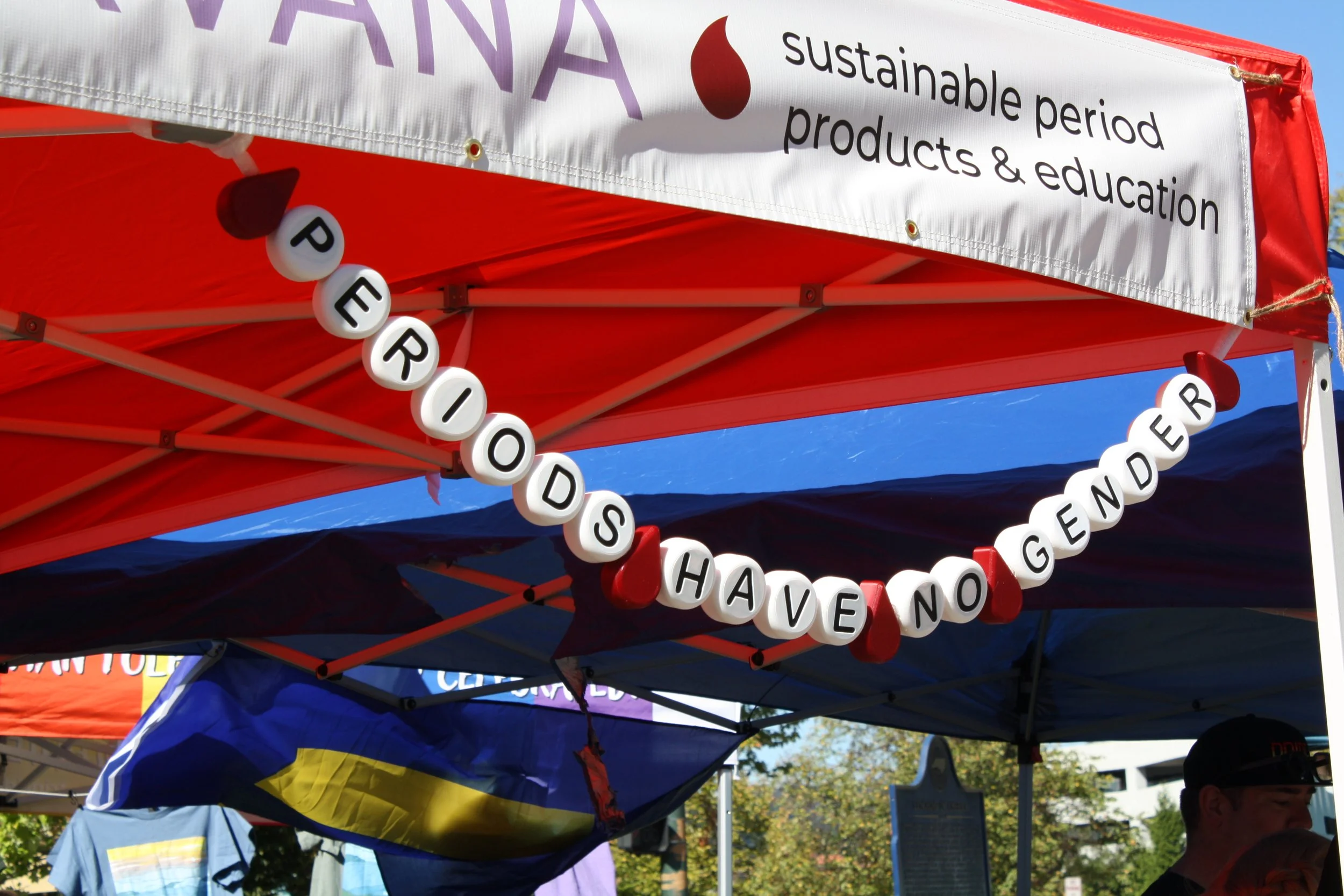 Period Nirvana's tent at Blue Ridge Pride sporting a sign reading “periods have no gender” on Sep. 26, 2026 in Pack Square Park in Asheville, N.C. (Echo/Emma Taylor McCallum) 