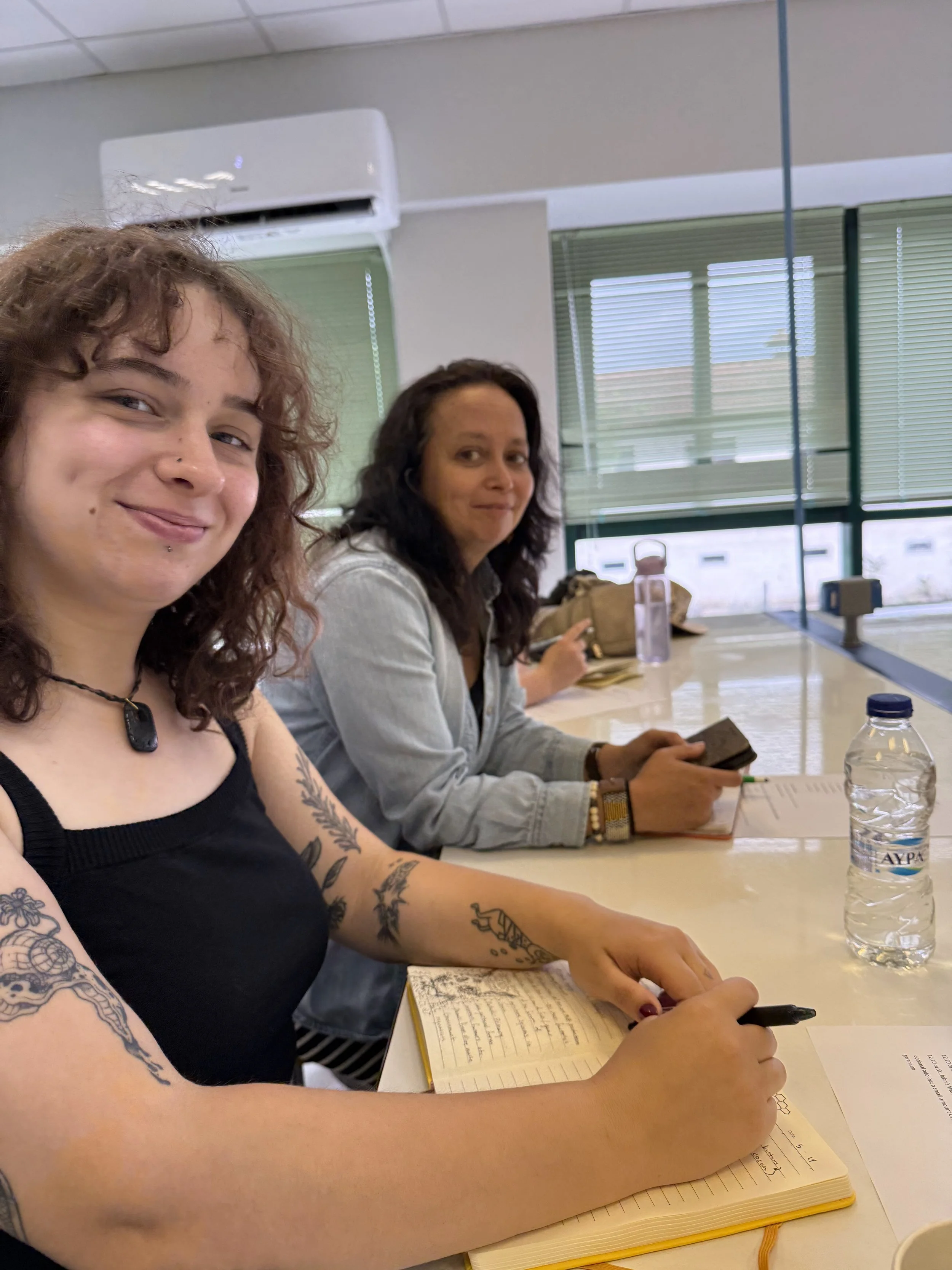  Toby Freel and Alisa Hove take notes during a lecture at Perrotis College in Thessaloniki, Central Macedonia, Greece on May 14, 2026 (courtesy of Jill Arnold) 