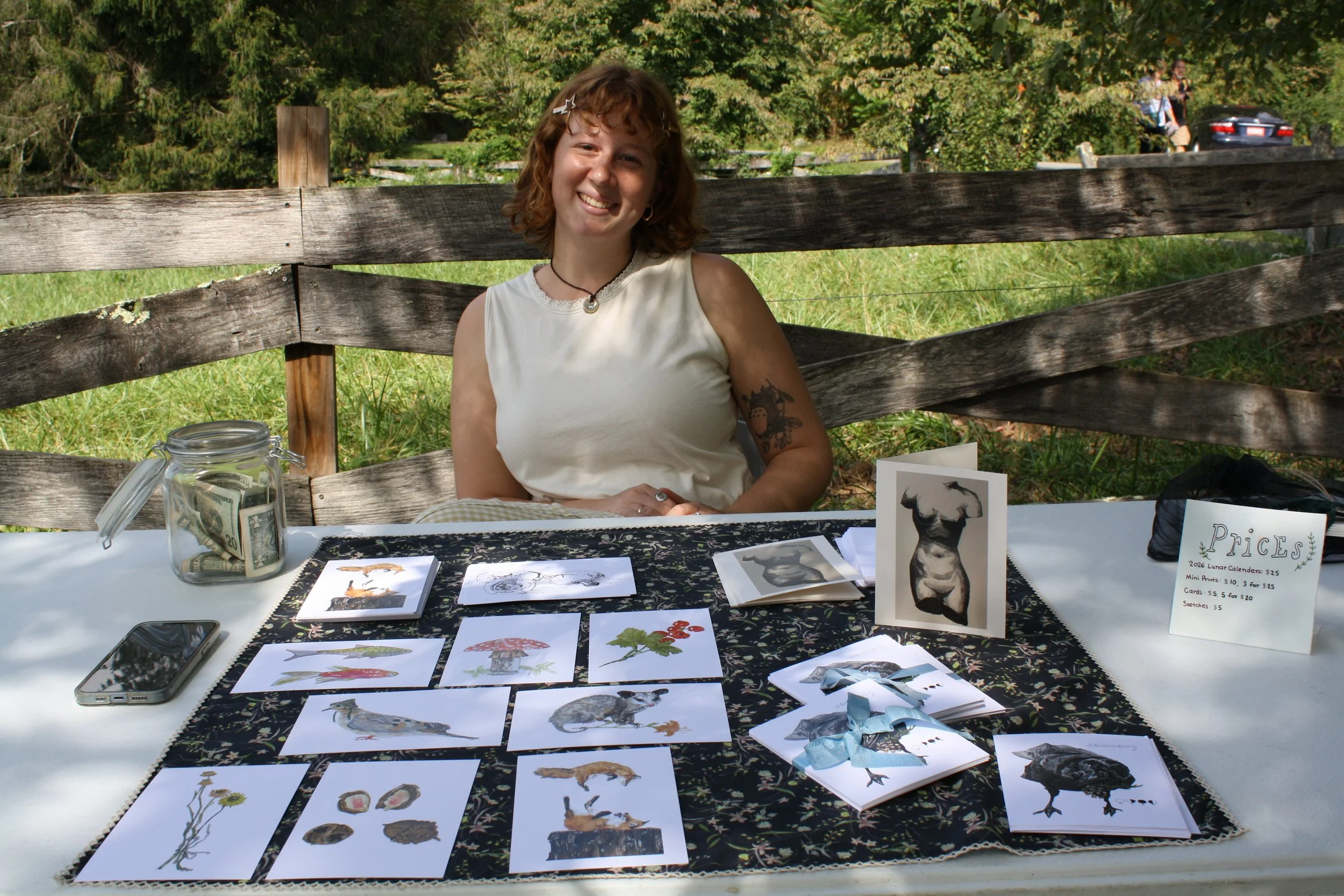  Kaia Caduff selling art prints during Fall Fest at Warren Wilson College on Oct, 3 2026. Swannanoa, N.C. (Echo/Emma Taylor McCallum) 
