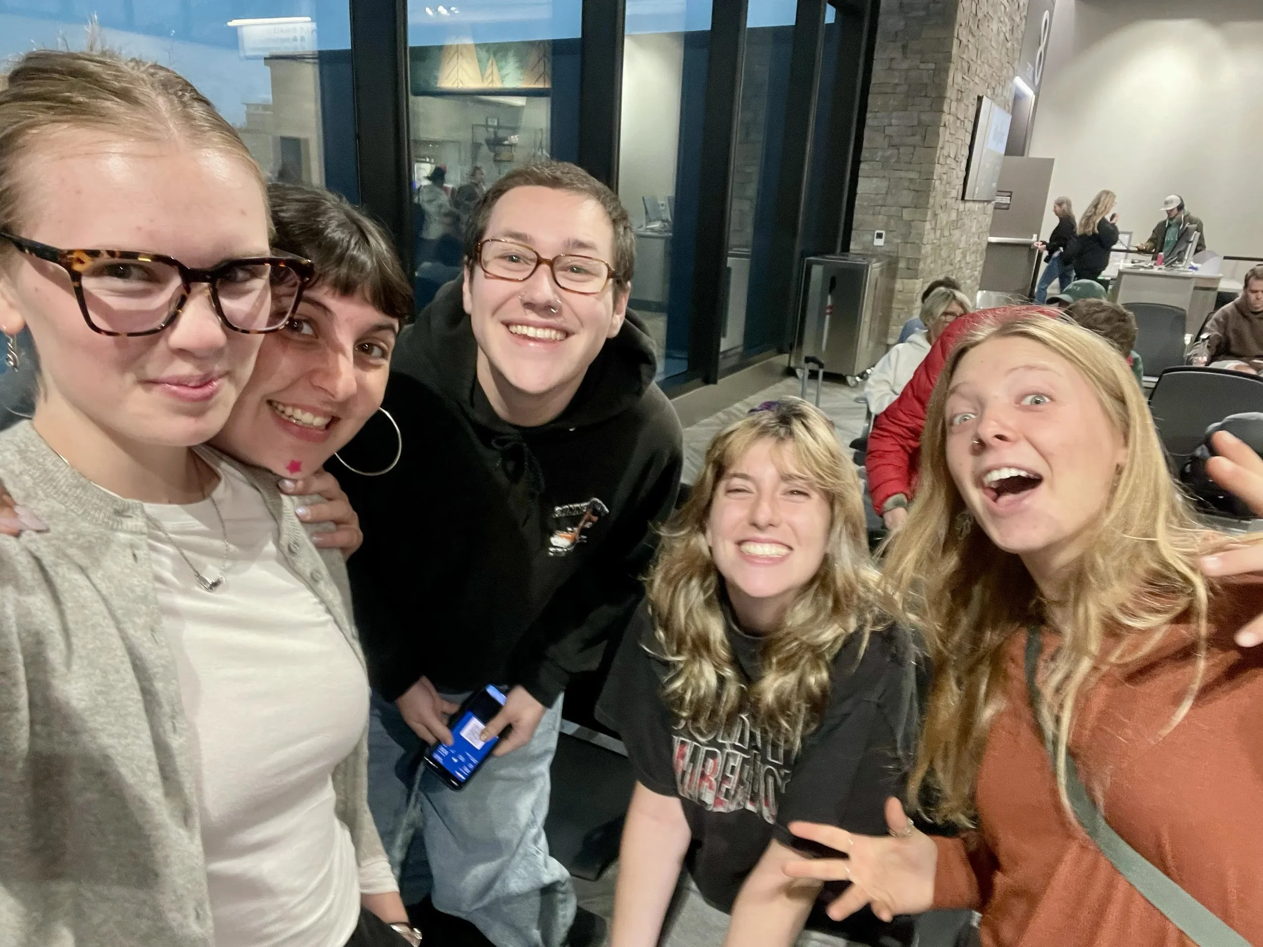  Emma Taylor McCallum, Ryleigh Johnson, Wyatt Layton, Leah Wedaman, and Solena Davidson Carroll having a fun time waiting for their flight to Boston at the Asheville Regional Airport. Asheville, N.C. on Oct. 10, 2026. (Echo/Emma Taylor McCallum) 