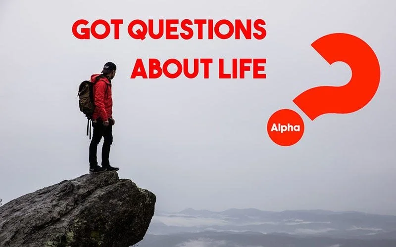 A person wearing a red jacket and backpack standing on the edge of a rocky cliff, looking down, with large red text that says 'GOT QUESTIONS ABOUT LIFE' and a red question mark with 'Alpha' in a circle.