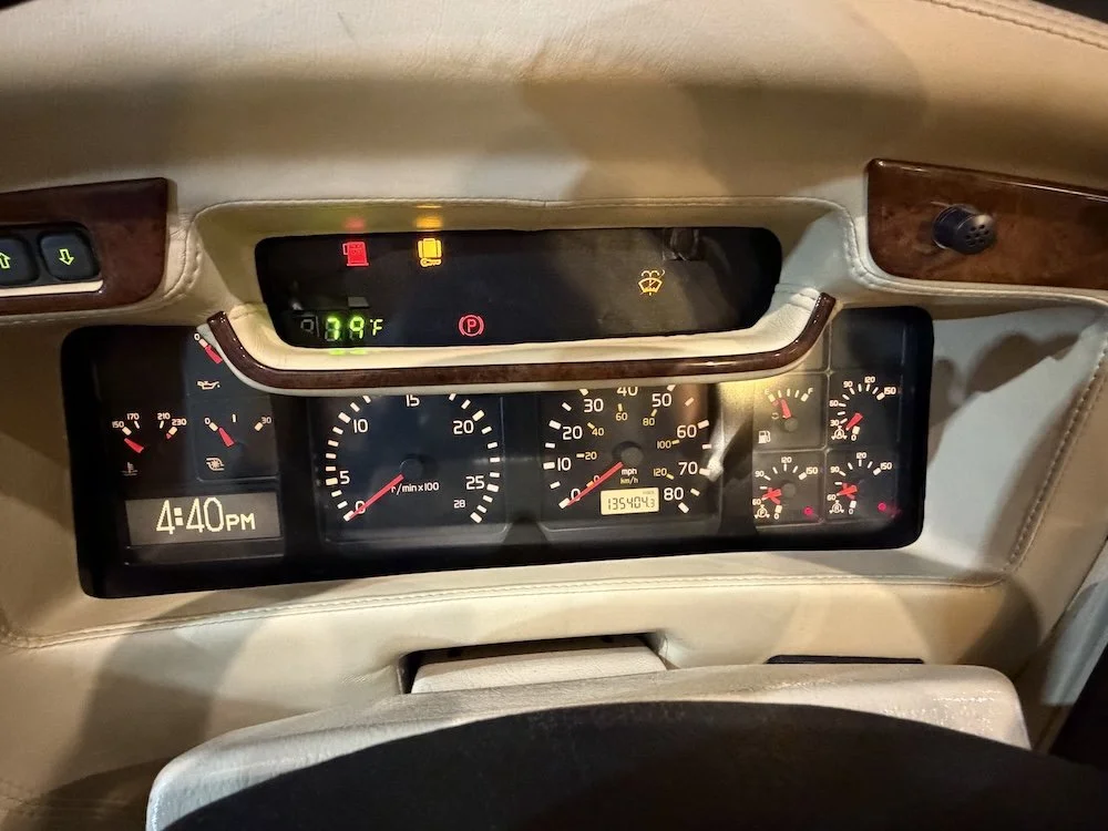 Close-up of the driver's dashboard instrument cluster and gauges.