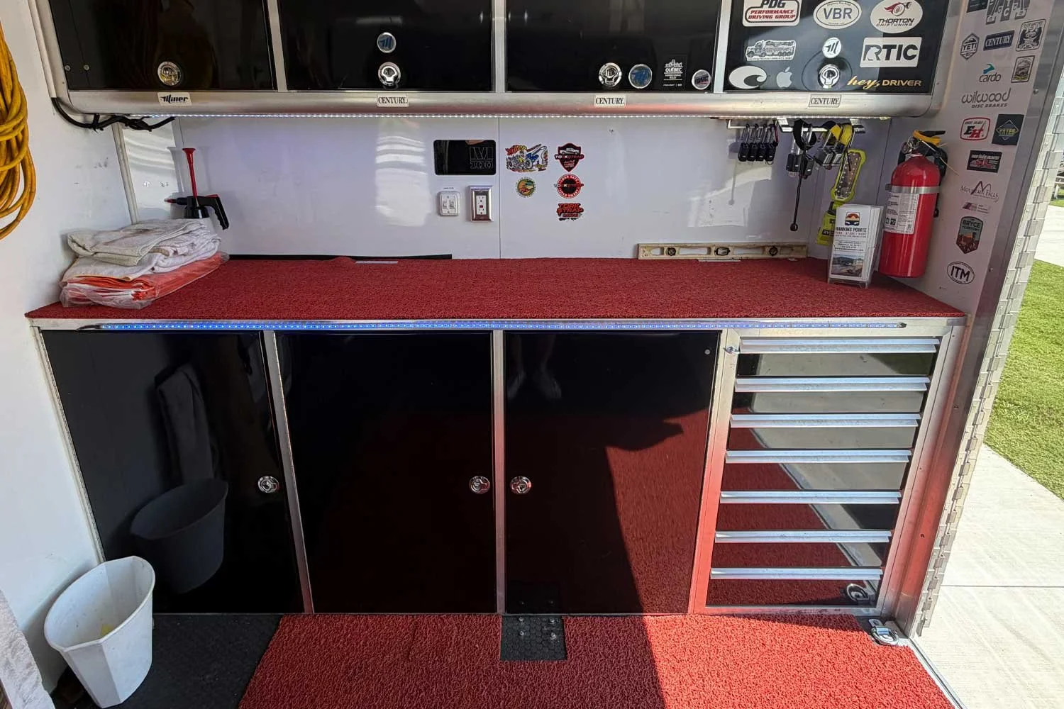 Storage cabinets and drawers with red flooring