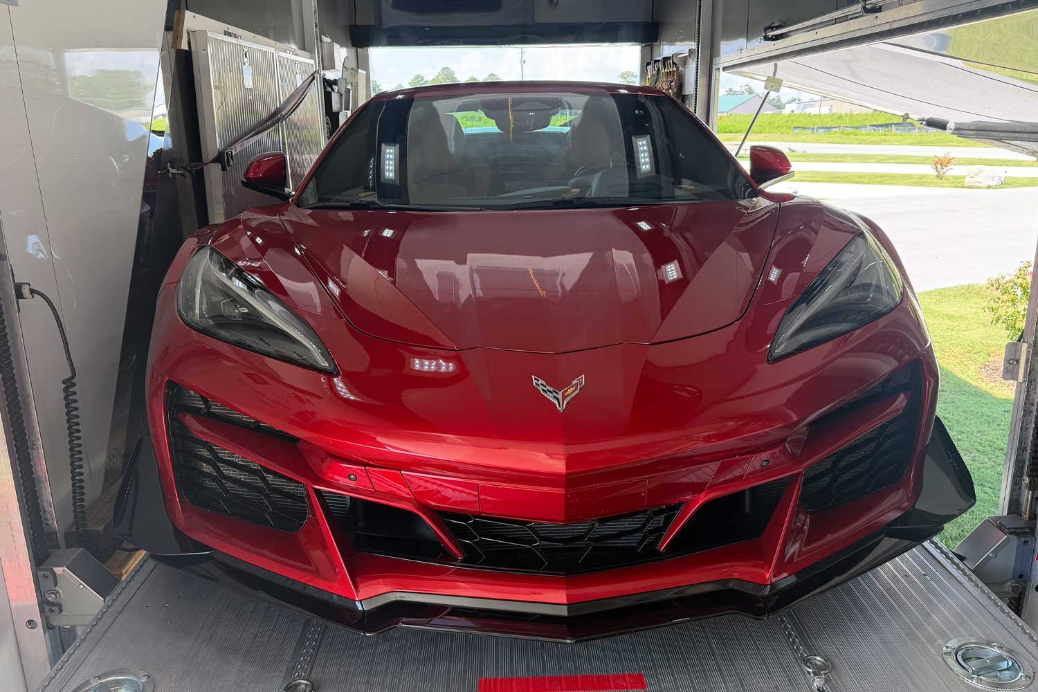 Front view of the Corvette loaded inside the trailer