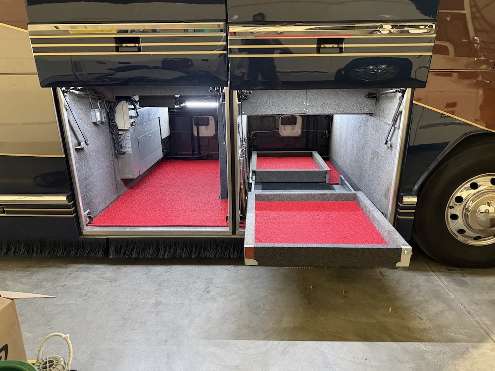 Open storage bays with red flooring.