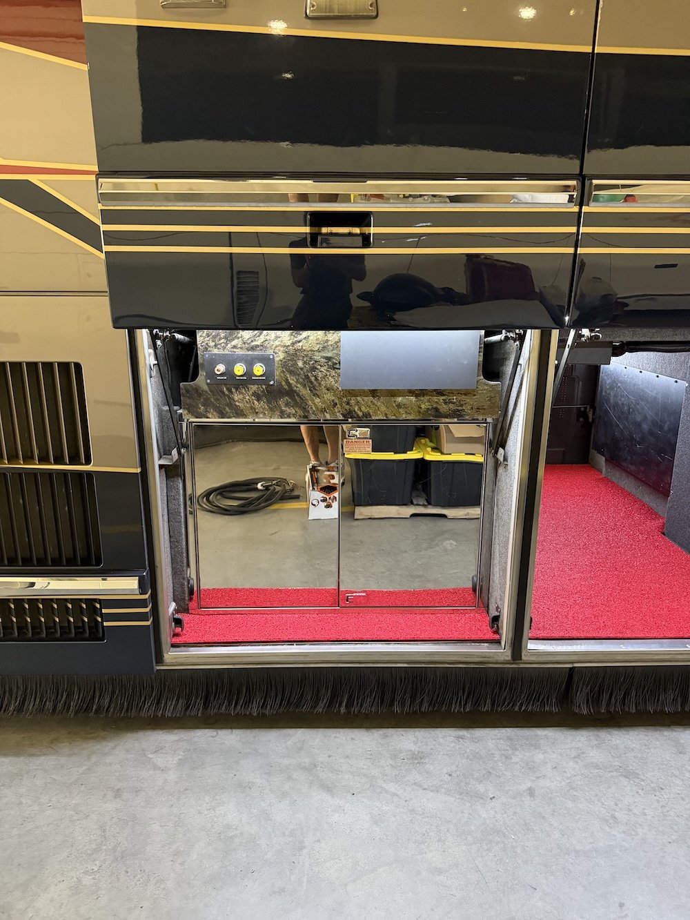 Storage bay with red carpet.