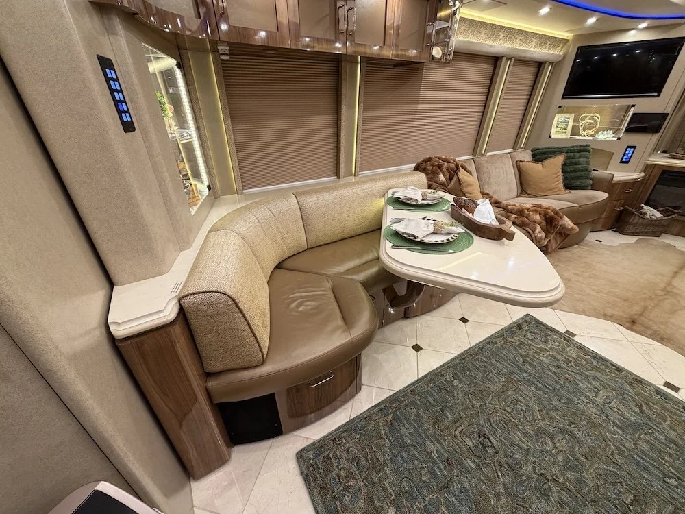 Dining area inside the 2019 Marathon Bunk Coach.