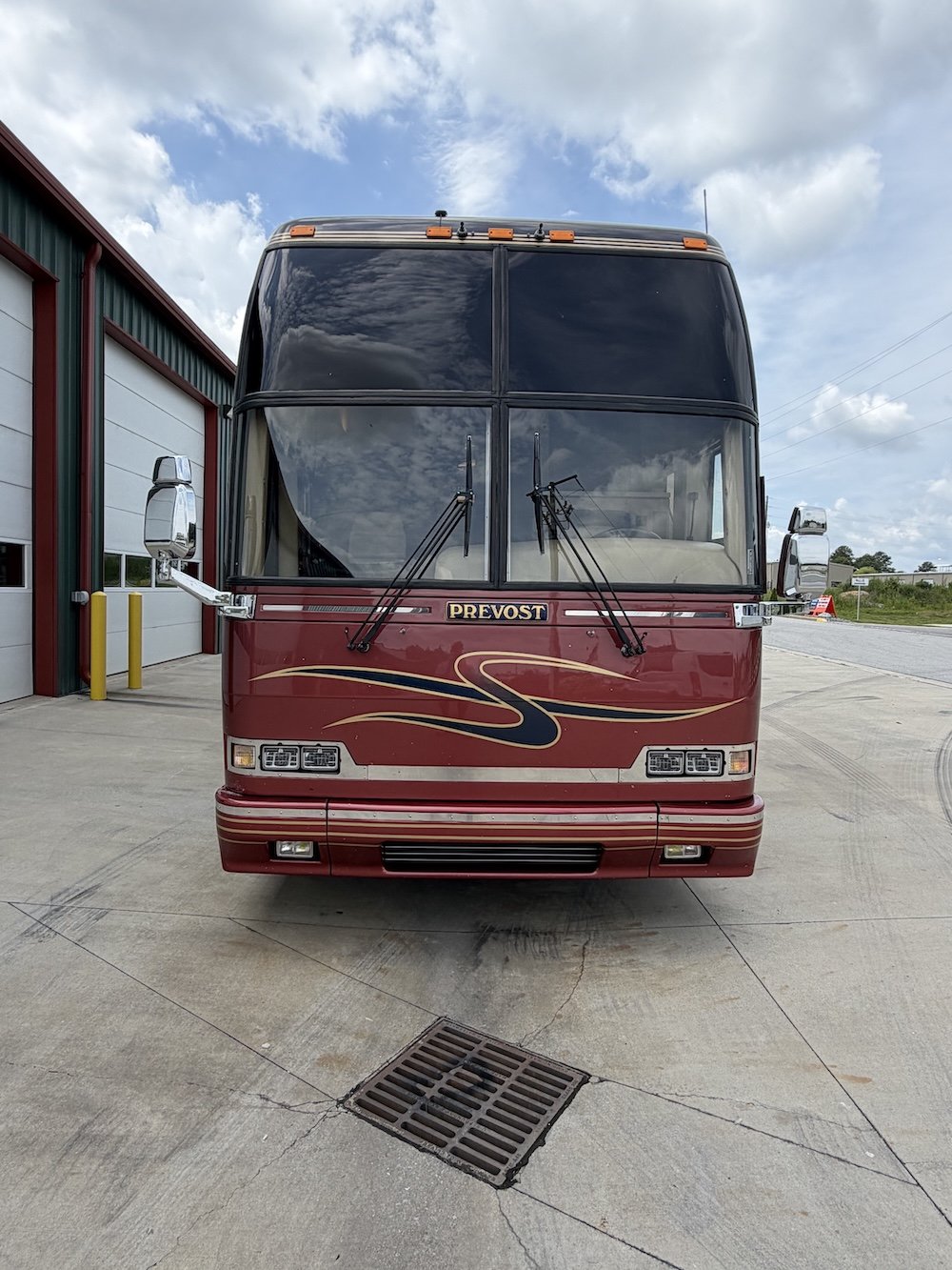 Front view of the coach with wipers and windshield.