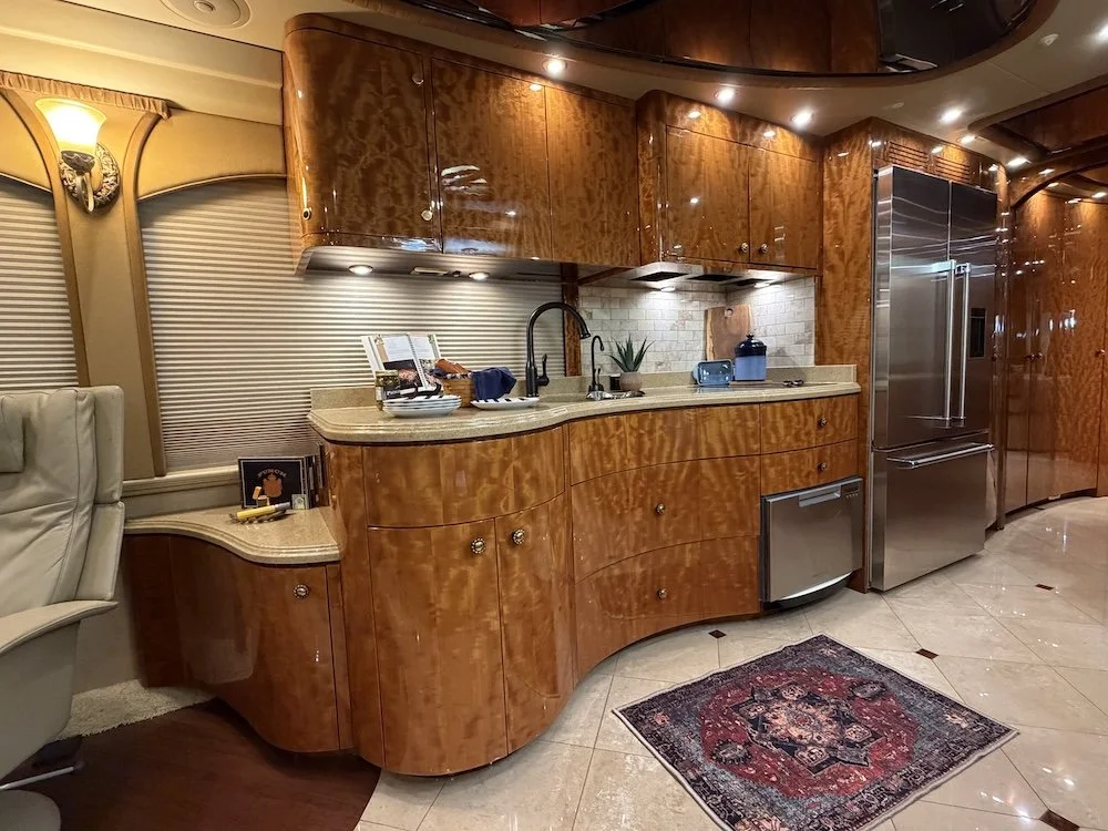 Luxury kitchen featuring the sink, dishwasher and fridge.