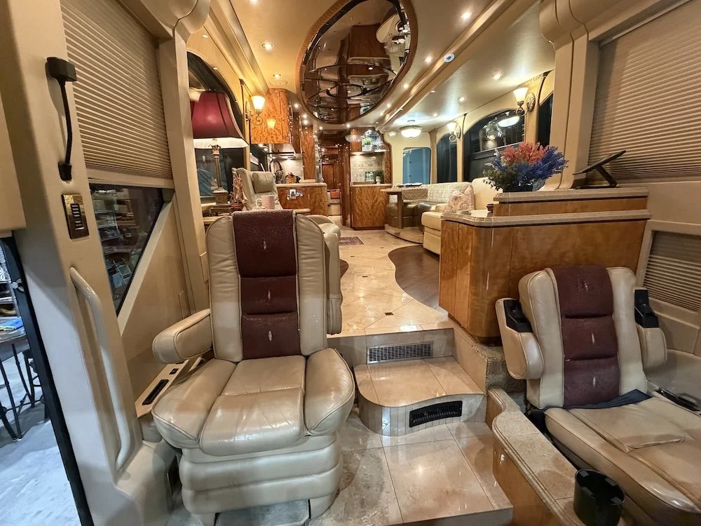 Interior view looking from the front of the cockpit to the back.