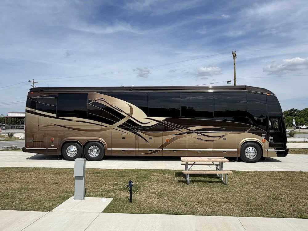 2008 Prevost Marathon H3-45 triple-slide coach in custom multi-tone paint scheme.