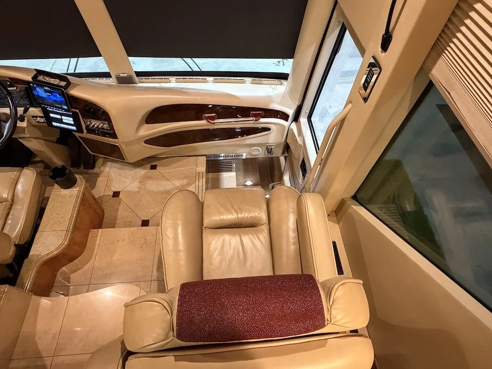 View of the leather passenger co-pilot seat and dashboard area.