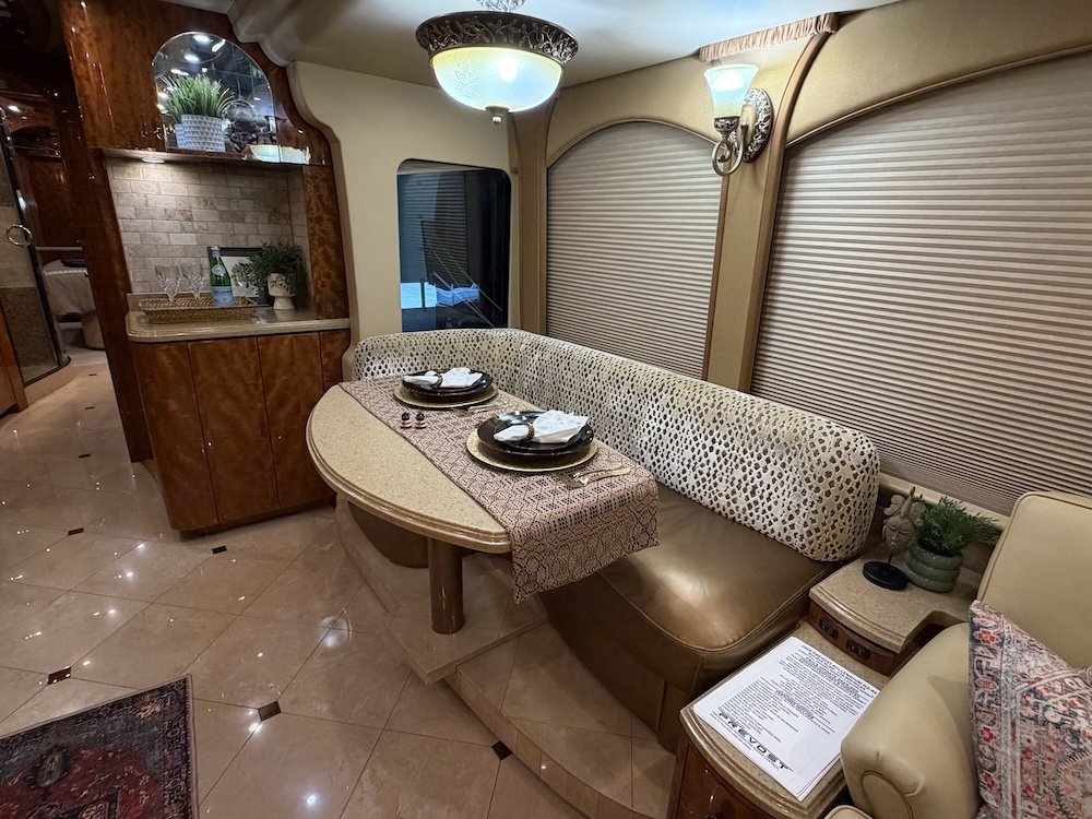 Interior of a cozy sitting area with side bar for drinks.