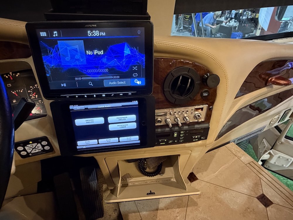 Cockpit center console featuring dual digital display screens and controls.