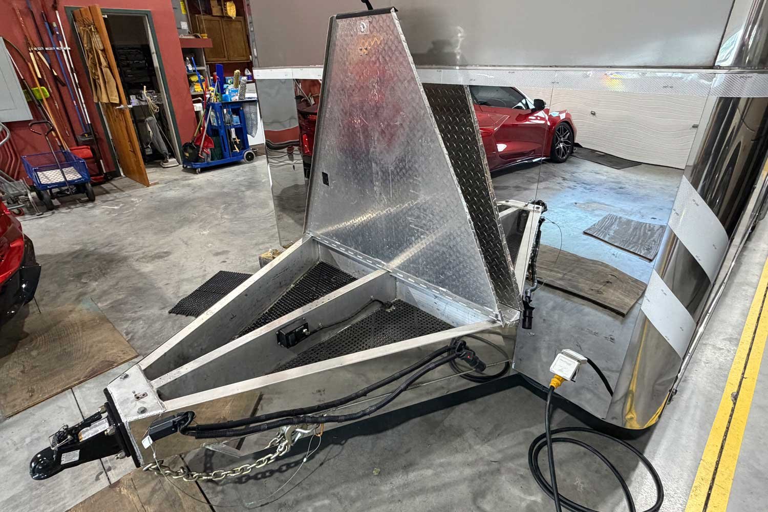 Trailer tongue open showing hydraulic jack storage