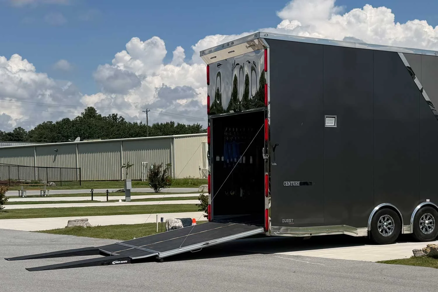 Rear view of the trailer with ramp deployed on pavement