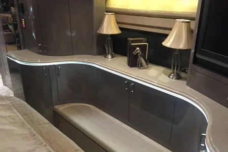 A high-end galley featuring integrated under-cabinet GLO in daytime.