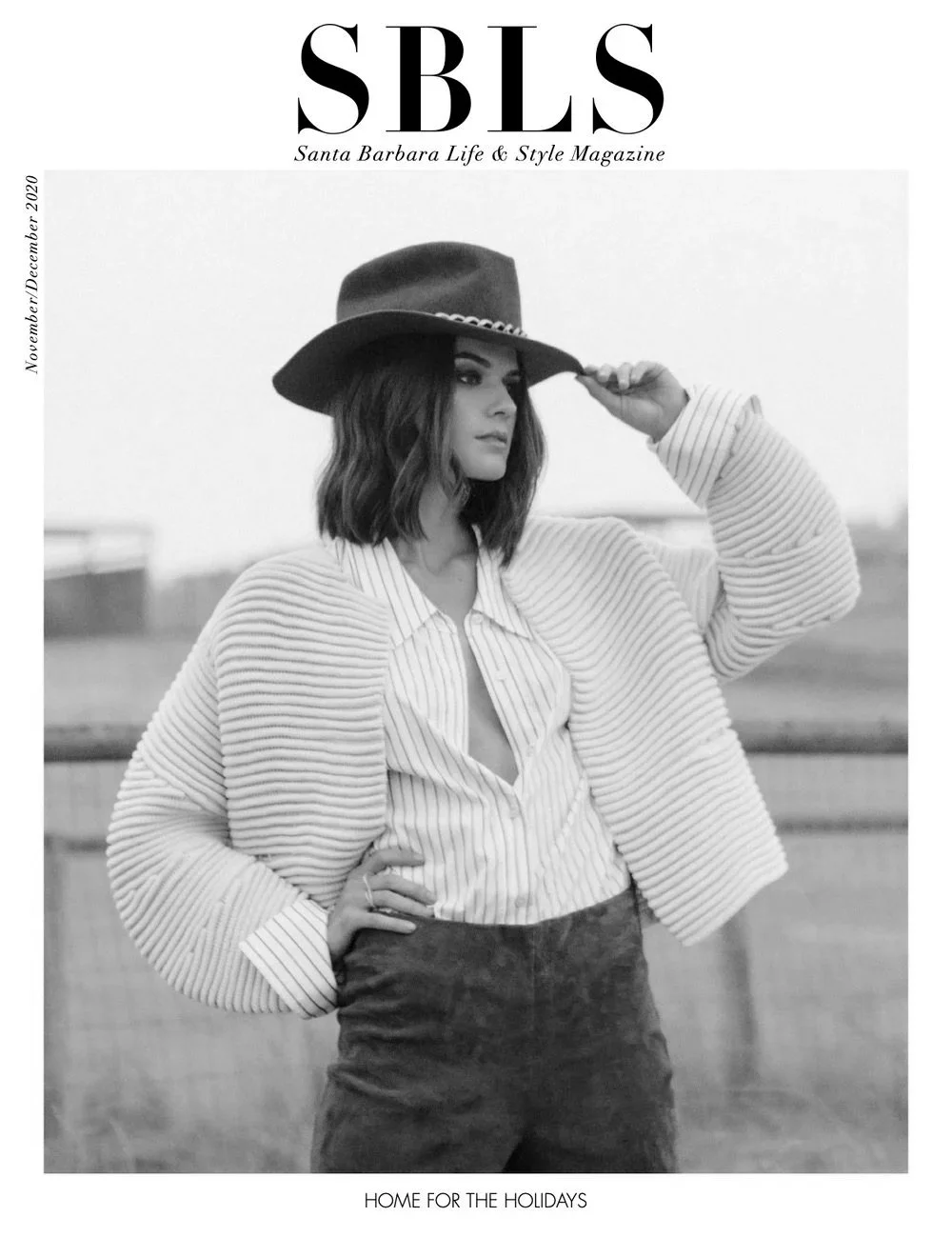 A woman wearing a striped shirt, a textured jacket, and a hat, posing outdoors on a magazine cover titled 'S B L S,' for Santa Barbara Life & Style Magazine, with the headline 'Home for the Holidays.'